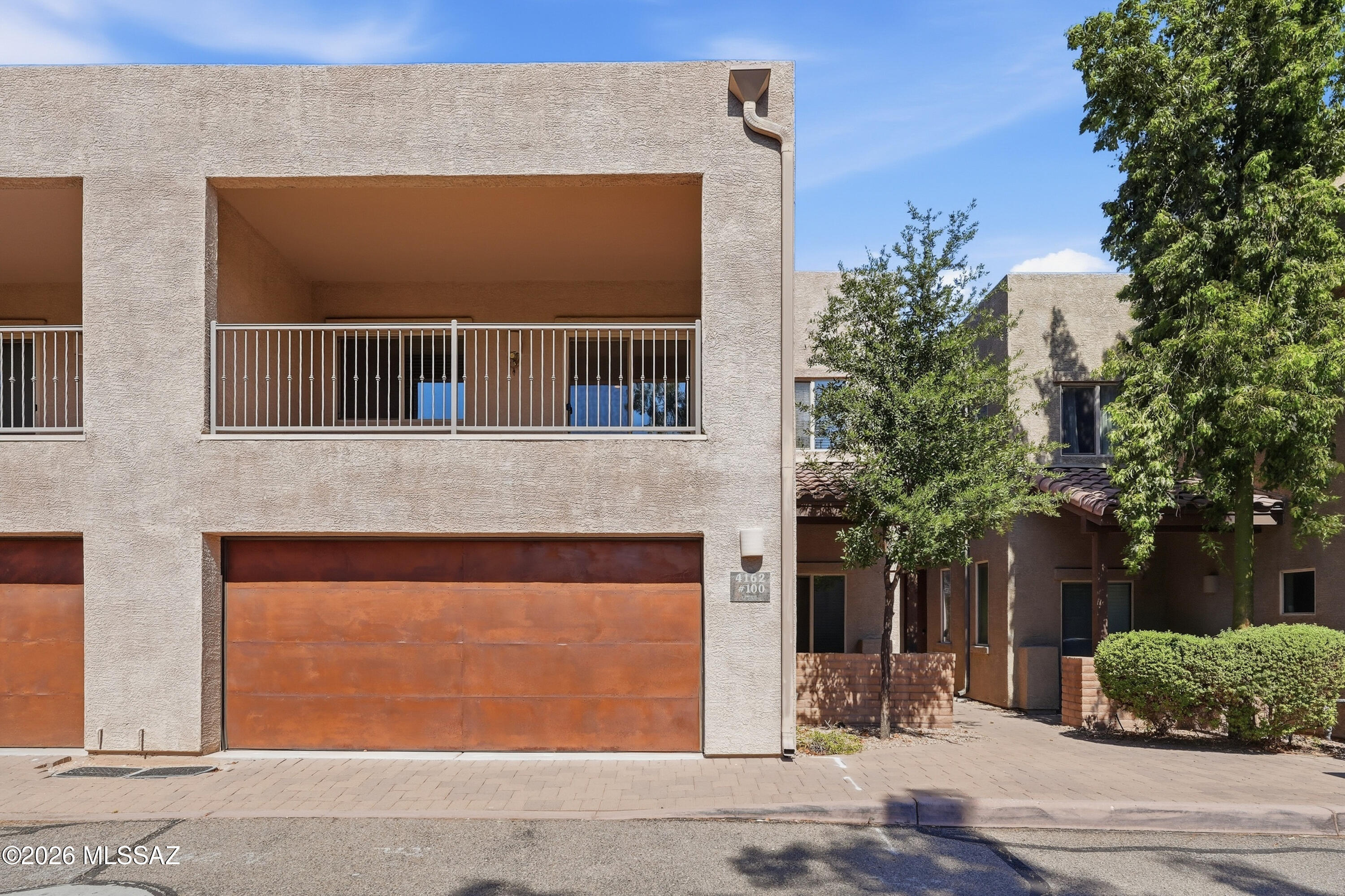 No Application Fees! Open floor plan 3-bedroom, 3-bathroom Tucson townhome located in the desirable Stone Crossing community. This spacious home features soaring cathedral ceilings, abundant natural lighting, neutral paint, upgraded fixtures, and an open-concept design that provides excellent living and entertaining space. The large living room offers direct backyard access and is complemented by an upstairs loft that provides flexible space for a home office, media room, or additional living area. The updated kitchen features granite countertops and backsplash, upgraded cabinetry, stainless steel appliances, dining area, and ample cabinet and counter space. One full bedroom and full bathroom are conveniently located on the first floor, making it ideal for guests or multi-generational living. Two additional bedrooms are located upstairs, including the oversized primary suite featuring a private balcony, walk-in closet, linen closet, and private bathroom with step-in shower. Washing machine and dryer are included for convenience. The attached two-car garage provides ample parking and storage space. The peaceful backyard features a covered patio, synthetic grass area, and added privacy with no rear neighbors.

Stone Crossing offers a community pool, beautifully maintained common areas, and convenient access to shopping, restaurants, schools, parks, and major Tucson employment centers. Located near Oracle Road with easy access to Downtown Tucson, the University of Arizona, Tucson Mall, and numerous dining and entertainment destinations throughout the area.

All Denali Real Estate residents are automatically enrolled in the Resident Benefits Package (RBP) for $55.00/month which includes Renter's Liability Insurance, Credit Building to help boost the resident's credit scores with timely rent payments, up to $1M Identity Theft Protection, HVAC air filter delivery (for applicable properties), our best-in-class resident rewards program, and much more!