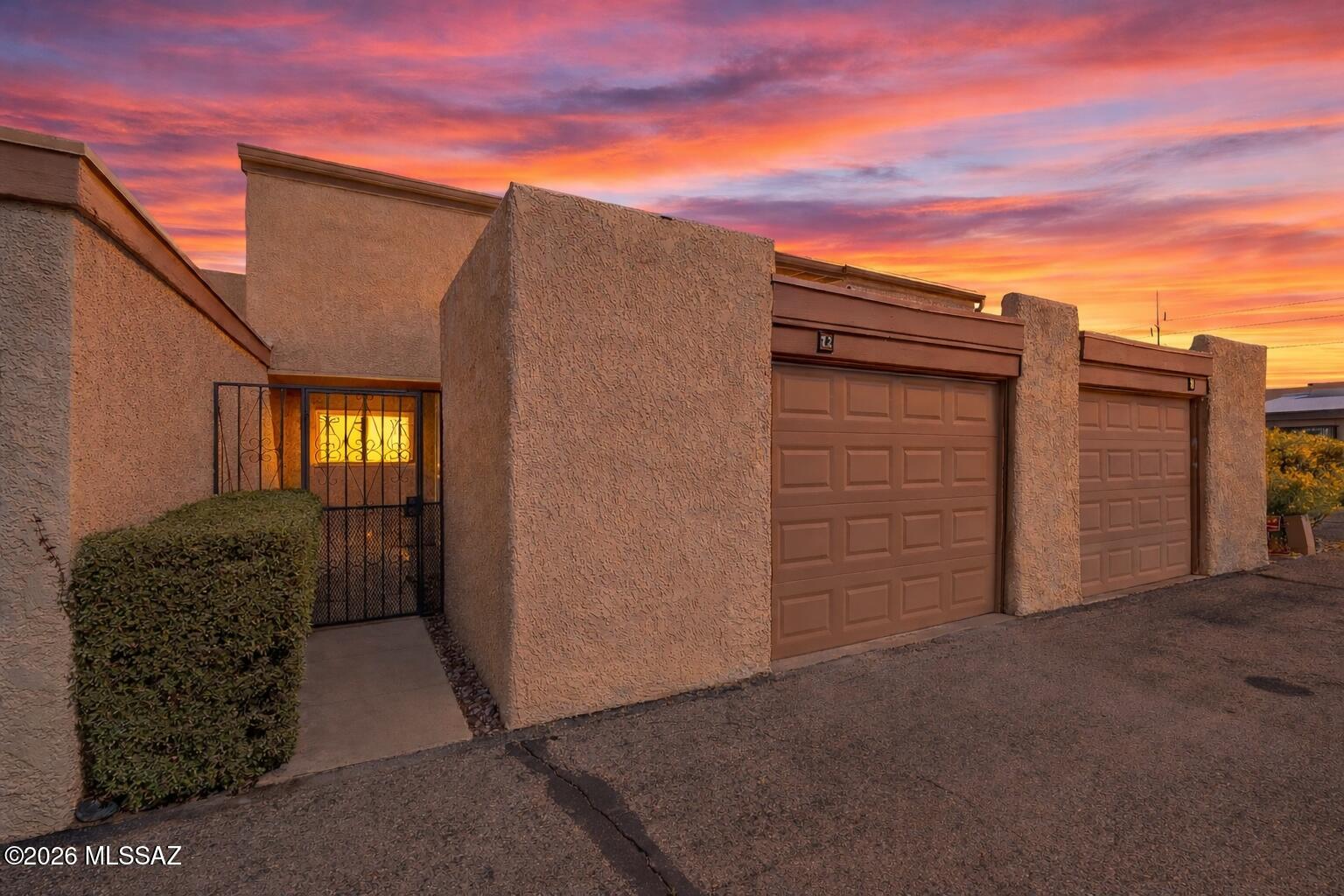 Tastefully remodeled-no work to be done! Move-in today & enjoy easy living in this 2bd/2ba Riverview unit with brand new luxury vinyl tile throughout-no carpet! Freshly painted interior. Light & bright with vaulted ceilings, new lighting fixtures, new stainless-steel appliances. Flexible living & dining room spaces. Dual paned windows & upgraded sliding doors to the patio. Stackable washer/dryer & pantry closet. Large primary bedroom upstairs with walk-in closet including built-ins & ample space for bedroom as well as sitting room or office. Gated entry courtyard, new garage door & 2 storage rooms. HOA covers roof, ext. maintenance, water, sewer, trash, termite/pest control & swimming pool. Easy walk to Tucson Raquet Club & Rillito Riverwalk. Convenient to bus lines & the U of A