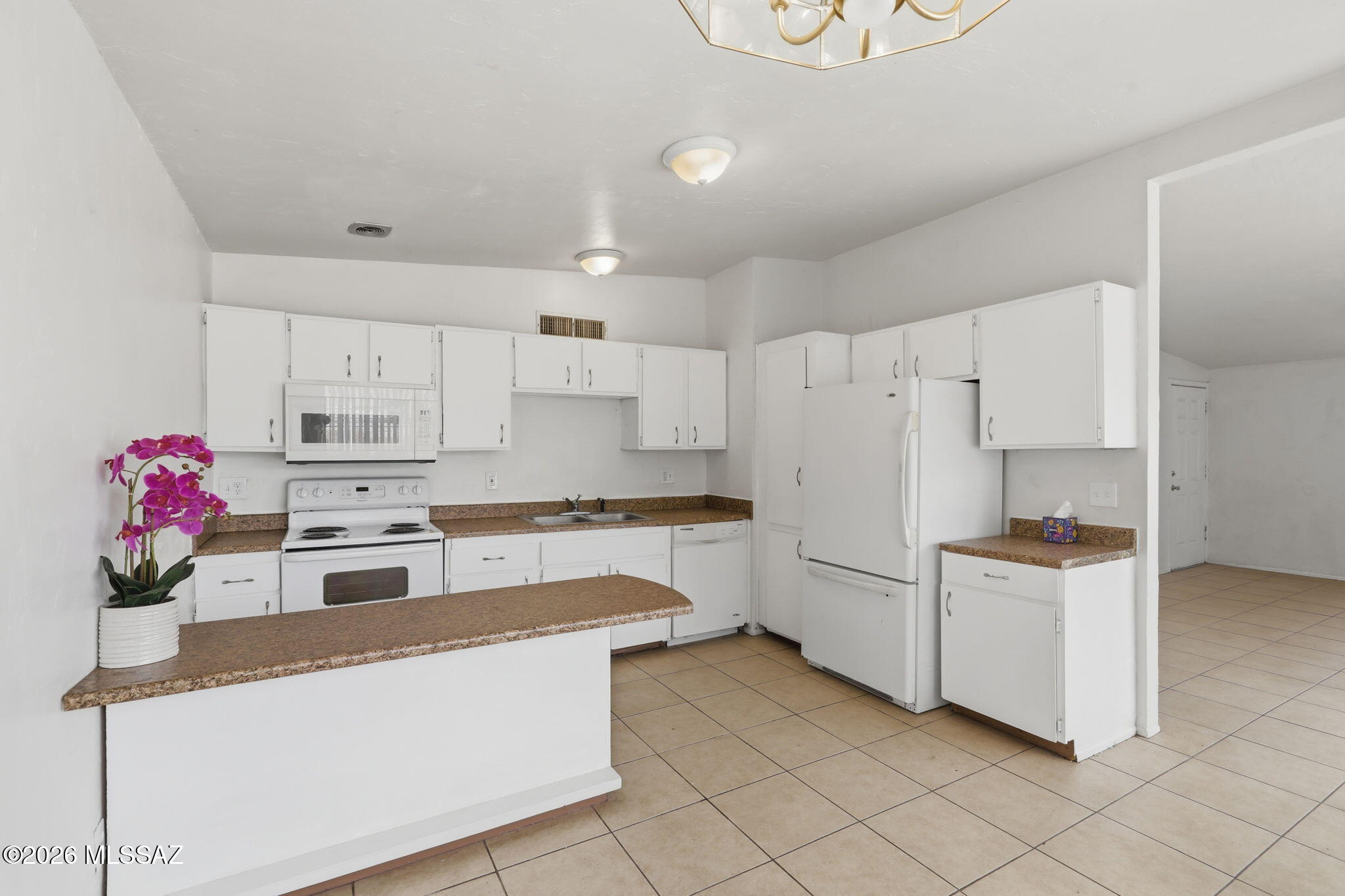 This well-maintained 3-bedroom, 1-bath home offers comfort, convenience, and opportunity all in one. Centrally located with easy access to shopping, dining, schools, and everyday amenities, this property is perfect for a variety of buyers. Inside, you'll find a functional layout with inviting living spaces and plenty of natural light. Step outside to enjoy the spacious yard -- ideal for entertaining, gardening, pets, or simply relaxing outdoors. Whether you're a first-time homebuyer ready to make your move, someone looking to downsize into a more manageable home, or an investor searching for your next income-producing property, this home is full of potential and ready for its next chapter. ***Range Priced from $240,000 - $250,000***