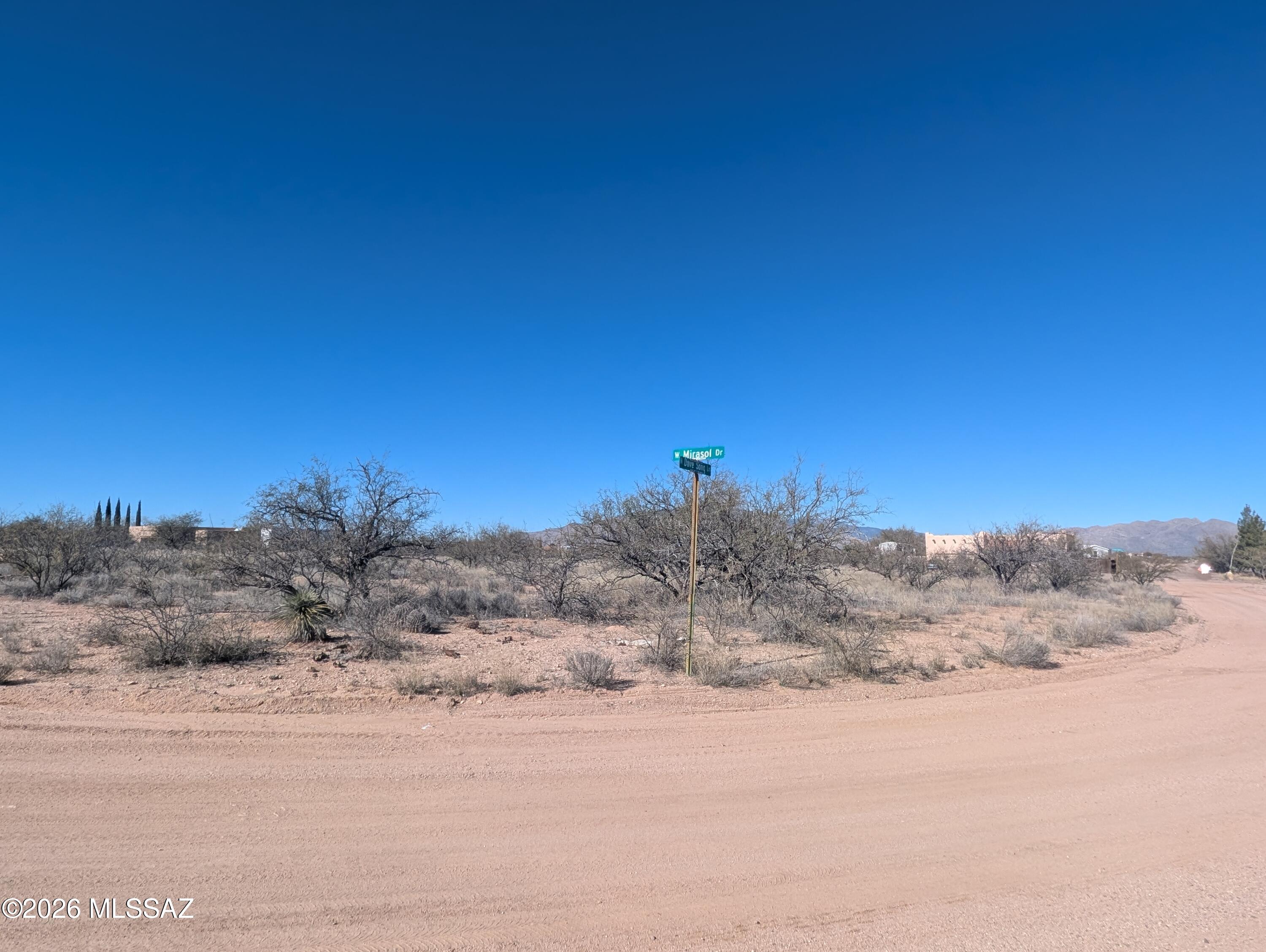 Build your dream on this prime corner lot with stunning mountain views and unforgettable sunrises and sunsets. Water and electric are available, making it easy to bring your vision to life. Enjoy open skies, added privacy, and the flexibility of a corner location. Conveniently located near I-10 for easy commuting to Benson, Sierra Vista, Vail, and Tucson, and within the Benson School District. Whether you're planning a custom home, a getaway retreat, or an investment property, this vacant lot offers the perfect opportunity to make it your own.