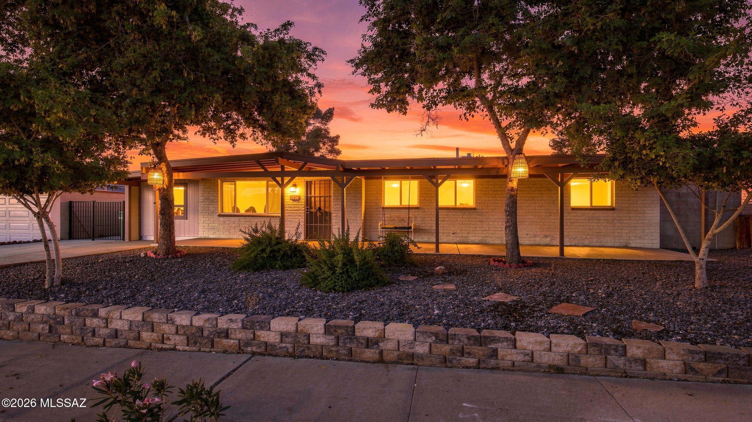Welcome home to this spacious 5-bedroom slump block home tucked away on a quiet cul-de-sac with no HOA! The home offers plenty of room to live, work, and entertain, with a dedicated office and comfortable family room providing flexible living space. Step outside to your private, block-walled backyard featuring mature trees, a fire pit, and a shed for added storage. Enjoy relaxing under the shade, gathering around the fire, or creating your own outdoor retreat. With five bedrooms, multiple living spaces, a private yard, and no HOA, this home offers the space and flexibility you've been looking for. The cul-de-sac location adds to the peaceful setting while the generous yard provides plenty of room to enjoy Arizona outdoor living.