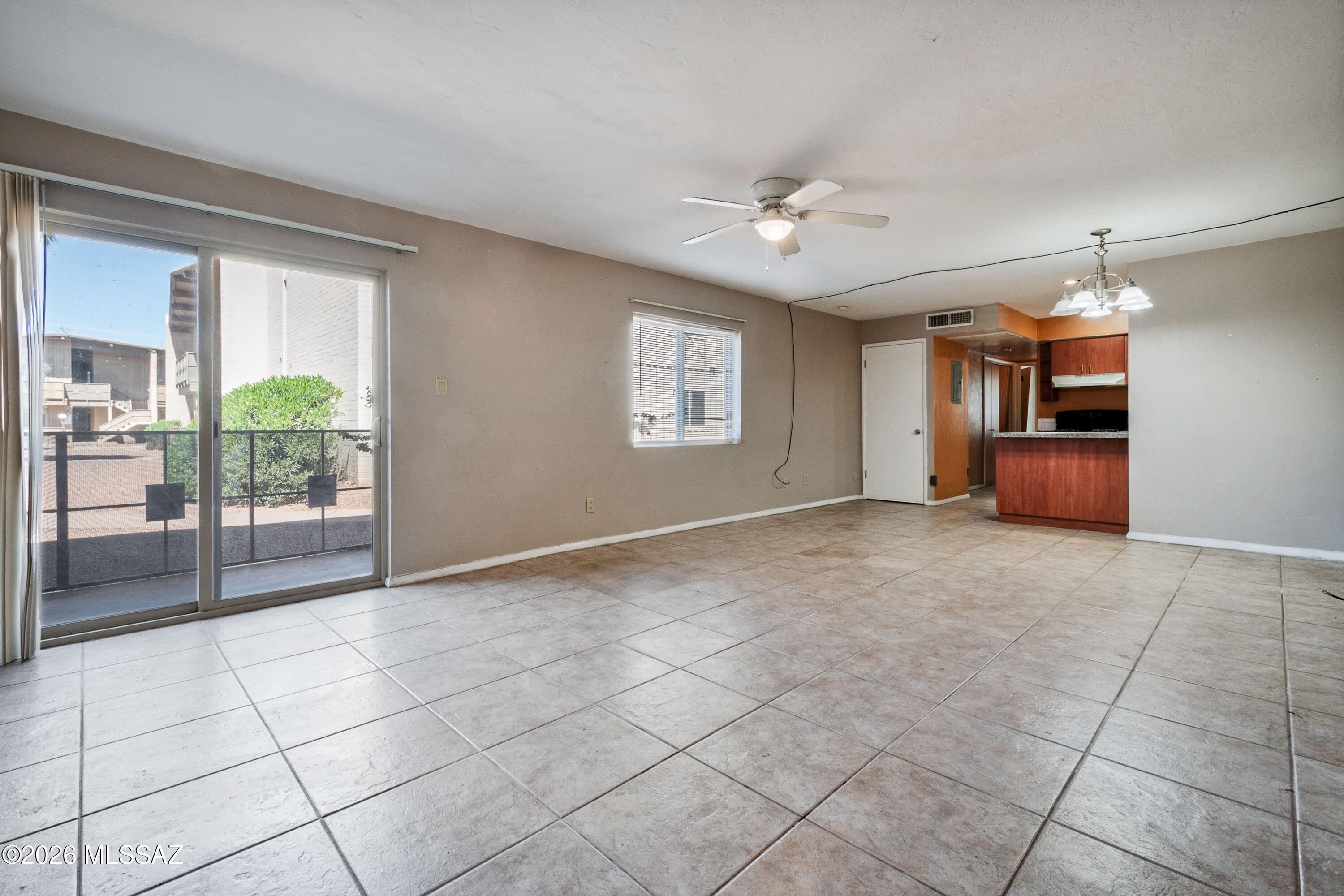 Perfect location in the community, front door leads right out to the pool, laundry included in the unit, no carpet, outdoor patio, all appliance included. Low cost opportunity, check it out today!