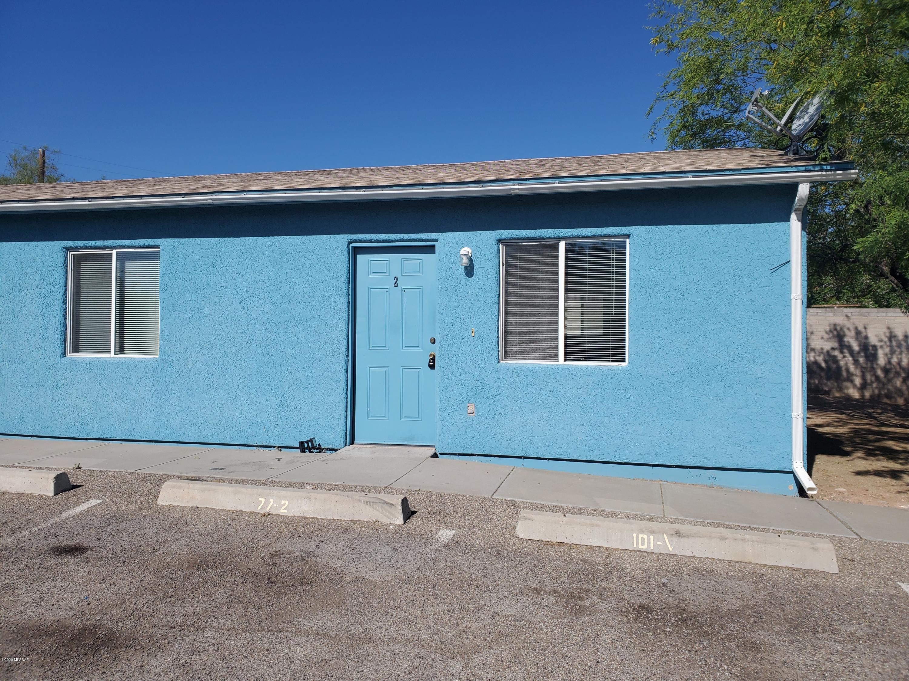 Charming, Southwest style 2 bedroom, 1 bath duplex.  Stained and scored colored concrete floors through-out. Kitchen features stained colored concrete counter tops with newer cabinets. Private covered patio. Washer and dryer hook-ups. Central AC to keep you cool and comfortable in the summer! Convenient to U of A, Pima CC
and Downtown.