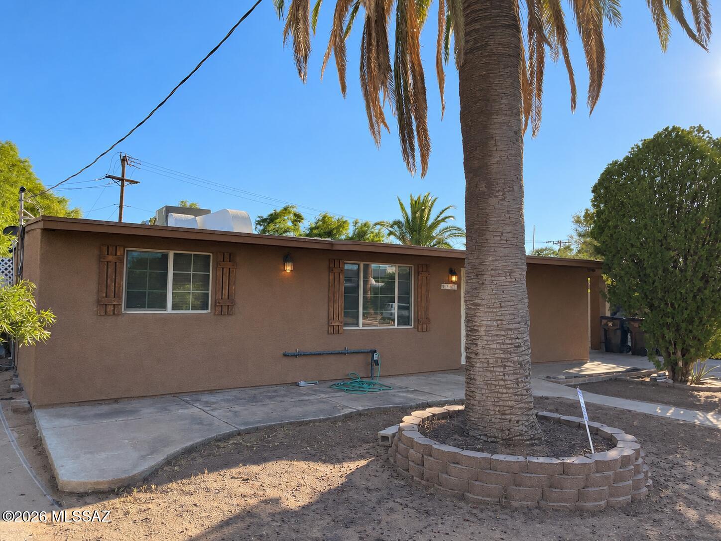 Located at the end of a cul-de-sac, this home offers a separate living room and an expansive family room with a fireplace, providing plenty of space to gather or unwind. The kitchen includes a breakfast nook, and a large laundry room adds everyday convenience. Tile flooring runs throughout the home except in the bedrooms, with dual-pane windows and a sliding glass door completing the interior features. A front courtyard and inviting backyard offer space for outdoor seating, gardening, or entertaining. Updated plumbing and fresh interior paint add to the home's appeal.