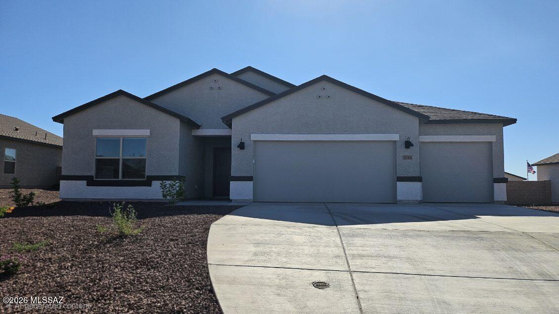 This floor plan offers 1,635 square feet of well-planned living space, perfect for those who appreciate both comfort and functionality. With four bedrooms, two bathrooms, and a 2-car garage, The Elgin provides the ideal setting for modern living amidst the beauty of the Santa Rita Mountains.

As you enter through the inviting front porch, you're welcomed by an open and airy floor plan that flows effortlessly from one room to the next. The heart of the home is the expansive great room, seamlessly connected to the dining area and kitchen, making it ideal for everyday living and entertaining. The kitchen is a chef's delight, featuring a large island with a breakfast bar, granite countertops, and Shaker-style cabinetry, offering ample storage and workspace.