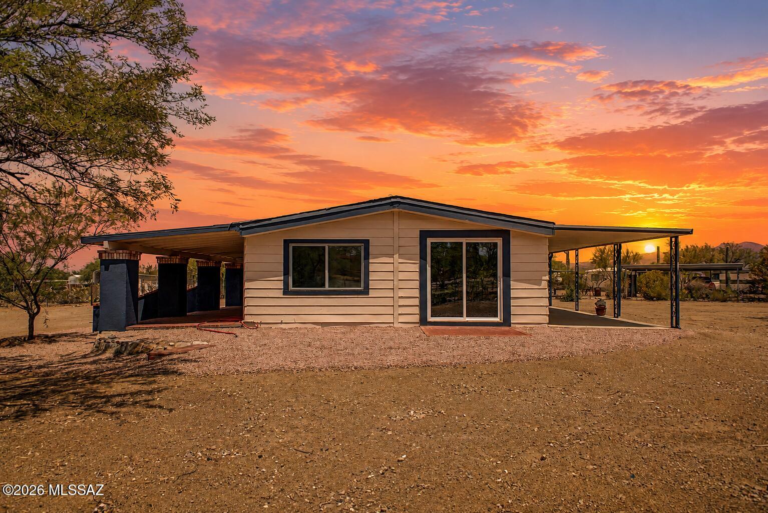 Fantastic opportunity to own this 3-bedroom, 2-bath home on a sprawling  1-acre lot! You're greeted by a spacious covered patio that sets an inviting tone. Inside, you'll find a bright and open layout with a soothing palette, recessed lighting, and stylish wood-look flooring. The updated kitchen comes with crisp white shaker cabinets and sleek stainless steel appliances for a delightful culinary experience. The primary bedroom includes a private bathroom for added comfort.t You'll be delighted by the attached casita, boasting sizeable living areas, a well-equipped kitchen, additional bedrooms, a bathroom, and a laundry room. Venture out onto the backyard, offering abundant space for crafting your dream outdoor oasis. Don't miss out on this fantastic opportunity. Owner financing available!