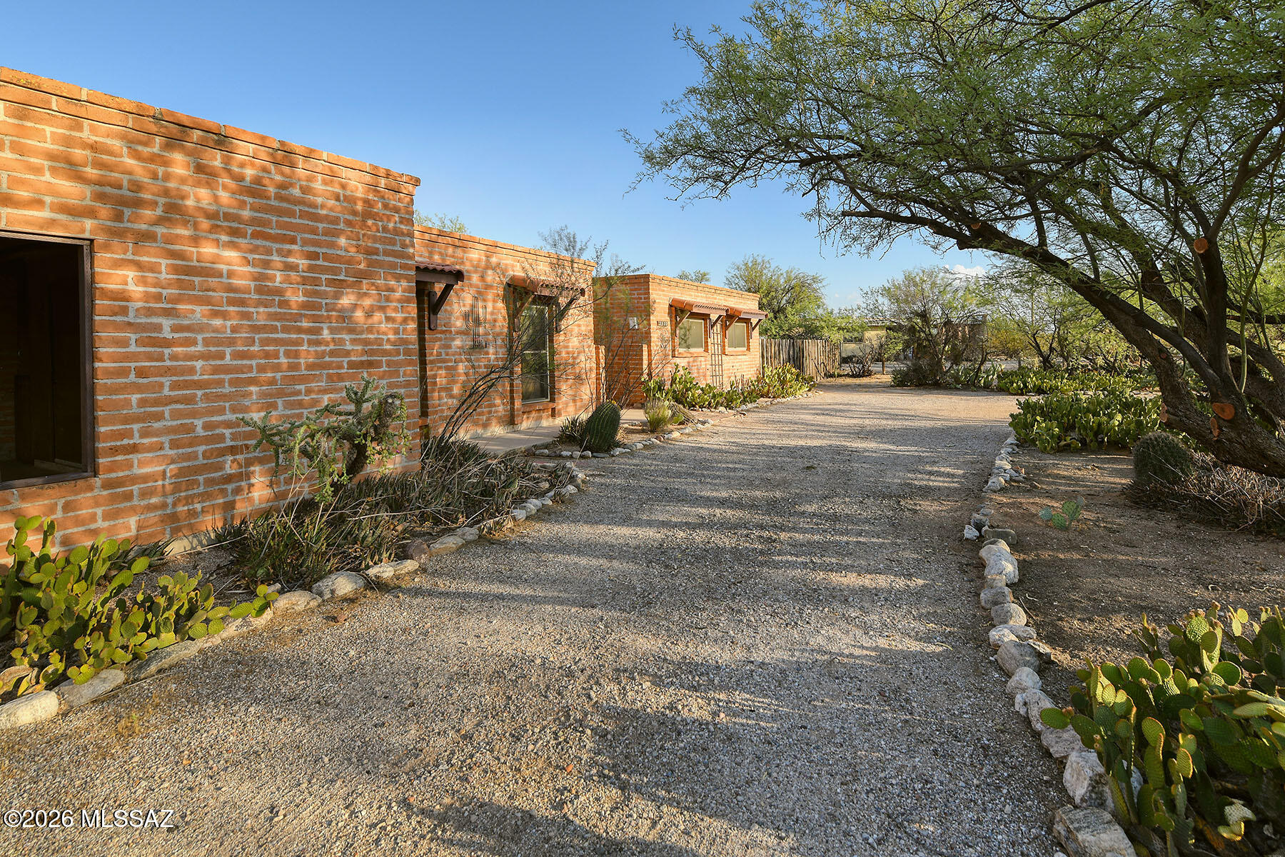 Charming home in the Tanque Verde Valley, offering timeless appeal and plenty of space to enjoy. The home features both a welcoming living room and a comfortable family room, providing flexible spaces for relaxing and entertaining. The kitchen includes a breakfast bar, breakfast nook, and doors leading to the back porch making it perfect for gatherings with family and friends. New carpet and paint add a fresh touch, while the pride of ownership is evident throughout the home. Situated on horse-zoned property, this home is perfect for equestrian enthusiasts or those seeking extra space and a rural lifestyle. The huge back of the property is fully enclosed, providing endless possibilities.  Don't miss this opportunity to own a well-loved home with the charm of southwest living. Same owner since the 1970s and the following improvements have been made in the 10 years:
New water line from meter to house, double pane windows on west side of house, new leach field, replaced HVAC system, new carpet June 2026, recoated roof, shower plumbing with access in both bathrooms and house rekeyed. 

There is a voluntary community association, Bel Air Estates Community Association (BARECA) more information can be found at bareca.org