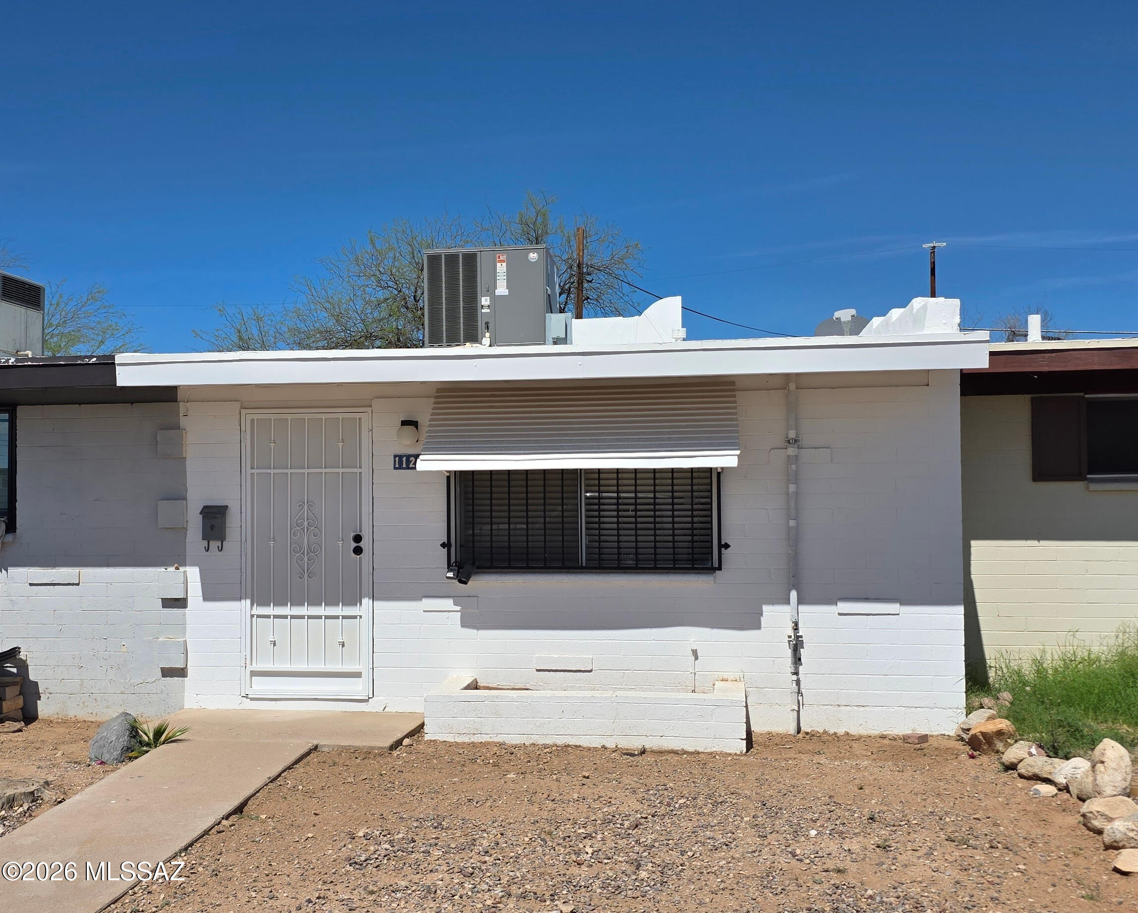 Move-in ready townhome offering comfort, convenience, and low-maintenance living! This charming 1-bedroom, 1-bath residence features an inviting layout and a private enclosed backyard--perfect for relaxing or entertaining. Ideally situated on Tucson's desirable south side, just minutes from parks, shopping, dining, and everyday amenities. Enjoy close proximity to El Pueblo Park, Santa Cruz River Park, and Tucson Spectrum. A must-see opportunity!