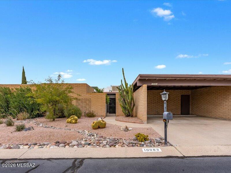 Charming townhouse in sought-after Oro Valley, set against stunning mountain views in the shadow of the Pusch Ridge Santa Catalina Mountainsâ”just minutes from the Oro Valley Country Club. This spacious 1,744 sq. ft. home is filled with abundant natural light throughout. Featuring 2 bedrooms and 2 bathrooms, the home has been freshly painted and includes new carpet in the primary bedroom. Enjoy a large living room, a convenient galley kitchen, and a family room that offers great additional living space. The elevated lot provides privacy, with back-neighbor views nicely shielded. Adjacent to the Oro Valley Golf Club community, two community pools, (one heated) within walking distance. This solidly built home is ideally located near shopping, dining, entertainment, golf courses, hiking trails, and bike paths.