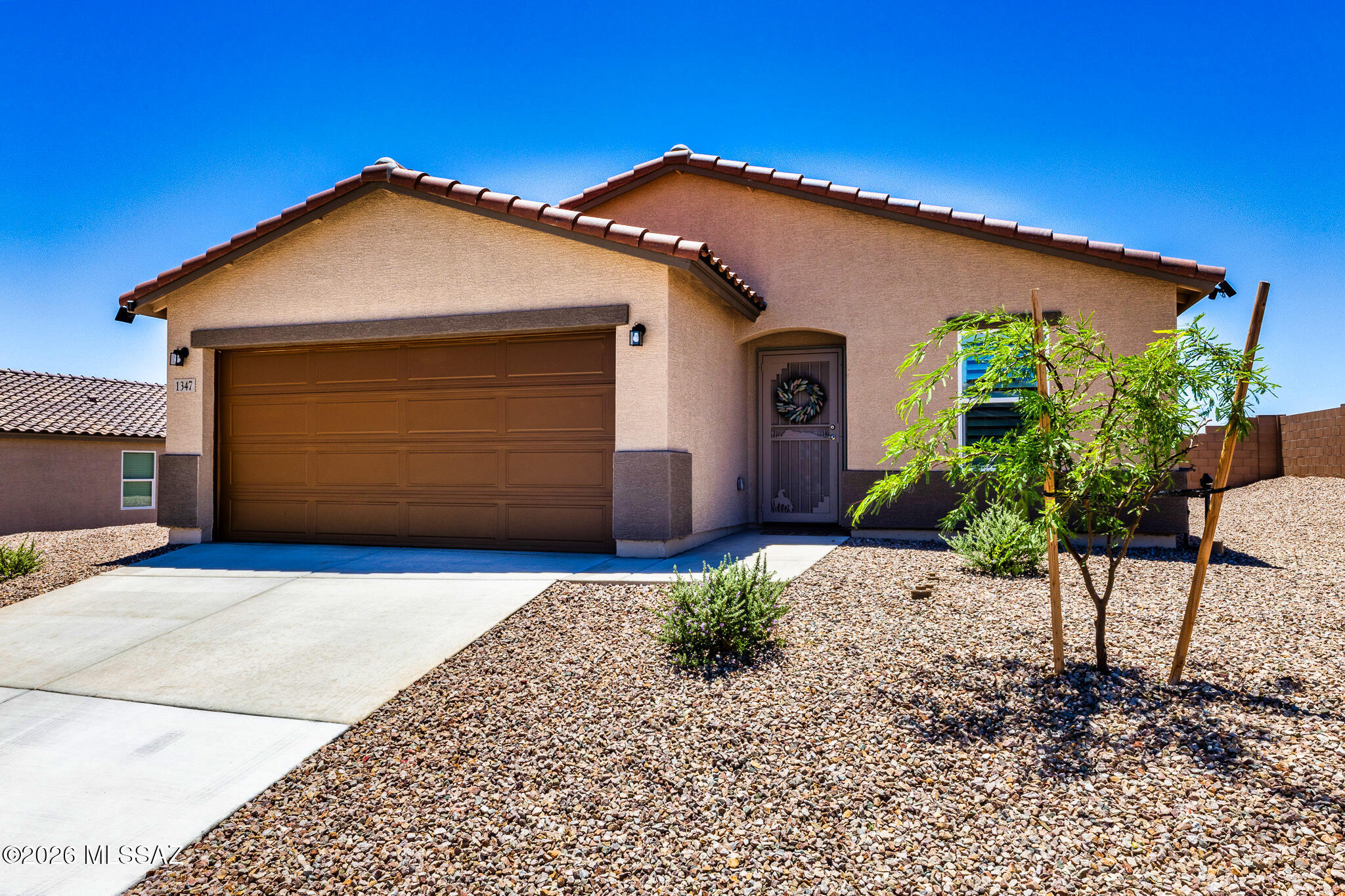 1 Yr old home in Canyon at Whetstone  Ranch. 3 Br, 2 Ba. Palmero Floor plan for open concept design. Seller has made some nice upgrades to this home such as finished back yard, Life Source, no Salt, whole house water filtration system, Ironworks metal Security and front doors. Glass shower doors.  Irrigation system was installed in the back yard,. Now both the front and back yards have controlled irrigation. Custom Plantation shutters. Ring Cameras. Plus the refrigerator, wash and dryer convey. Nice Mountain views from the back yard. Tile Roof. Double Vanity in the Master bathroom. Large walk-in closets. Granite counter tops. Clean and move in ready. 5 minutes to I 10. 30 Min. to Tucson.