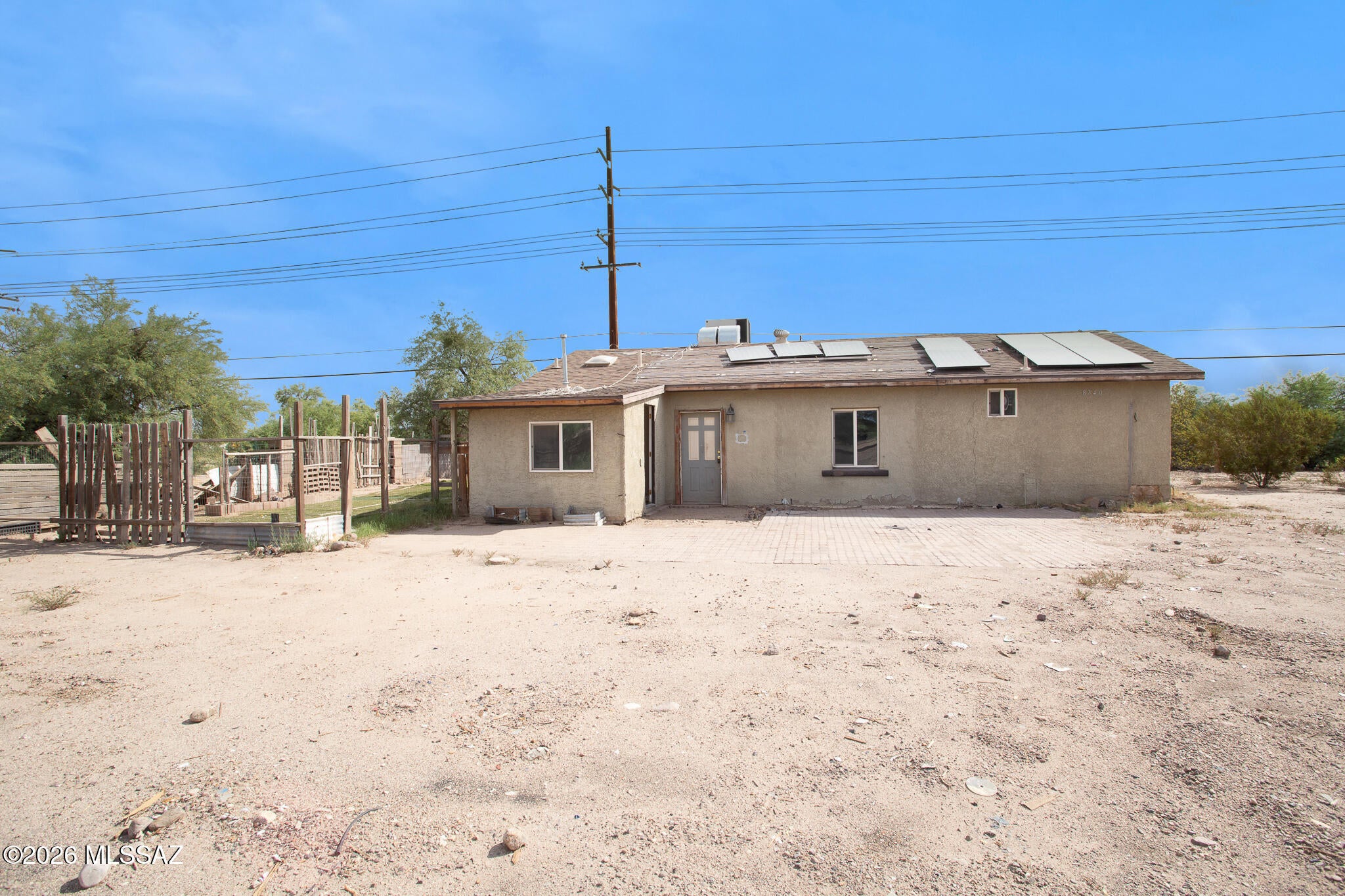 This ranch style home in Rillito presents an opportunity for buyers seeking potential. The home sits on large 0.61 acre lot with no HOA and features a split bedroom floorplan, offering flexibility for various living arrangements or rental configurations. The home includes two bedrooms and two bathrooms with a layout designed to separate the primary bedroom from the secondary bedroom, a practical feature for privacy or multi-occupant scenarios. A dedicated laundry room adds functional convenience to the floor plan. This property rewards vision and effort from an owner willing to invest in updates and improvements. Schedule a showing today to explore what this home could become with your personal touch. This is a Fannie Mae HomePath property. Attention First Time Buyers, complete the HomePath Ready Buyer homeownership course on Homepath.com. Attach certificate to offer and request up to 3% closing cost assistance. Check HomePath.com for more details. Restrictions apply.

Mobile home on-site is personal property only (not titled to seller, not conveyed with sale) sold as-is, buyer to independently verify, investigate and pursue any available legal remedies (e.g., abandoned title procedures under state law) to establish title, at buyer's sole cost and responsibility.