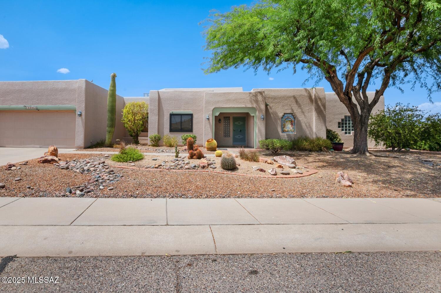 This lovely Pierce built home is located in the beautiful community of Portillo Ridge, centrally located in Green Valley.  This home has two extensions;  a large office & a craft/hobby room was extended off the main bedroom & a spacious storage/laundry off the garage. Want a den instead of an extra 3rd bedroom: the 3rd bedroom makes a great den off the living room w/double doors. Kitchen updated & guest bath shower updated.  Roof just recoated 6/17/25. You'll find lots of space & tons of storage in this home. Peaceful setting in the back with a mountain view from the side patio. All interior including garage & storage room has been freshly painted, all carpeted areas have new carpet & all tile is brand new. Come take a look. New front exterior lights on order.