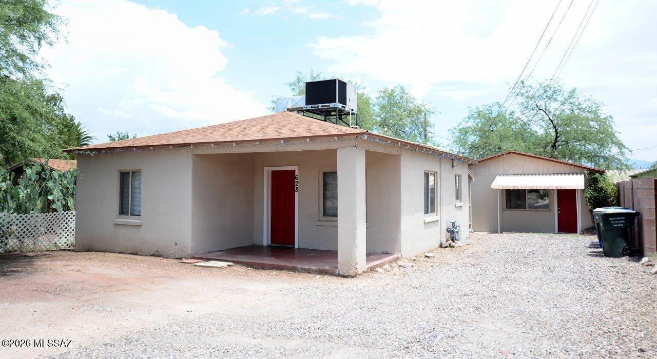 Don't miss this charming duplex located in  central Tucson.  Only a 10 minute drive from the University. Both units have updated kitchens, bathrooms, windows and more. Tile floors throughout. Each unit has its own private backyard and onsite parking. Great investor opportunity or live in one and rent out the other.