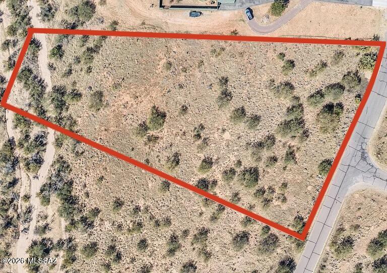 Discover the perfect setting for your future home on this stunning 3-acre lot in the desirable Red Hawk at J-6 Ranch community in Benson, Arizona.  Surrounded by sweeping panoramic mountain views and endless Arizona skies, this property offers the peace and privacy you have been searching for.
With paved roads, underground electric, and water available at the property line, the groundwork is already in place to make building simple and stress free.  Conveniently located just off i-10, you will enjoy rural tranquility while still being only 15 minutes from downtown Benson and 30 minutes from Tucson for shopping, dining, and everyday conveniences.  This is the ideal canvas for a custom home, weekend retreat, or long-term investment in one of Southern Arizona's most beautiful and growing areas.