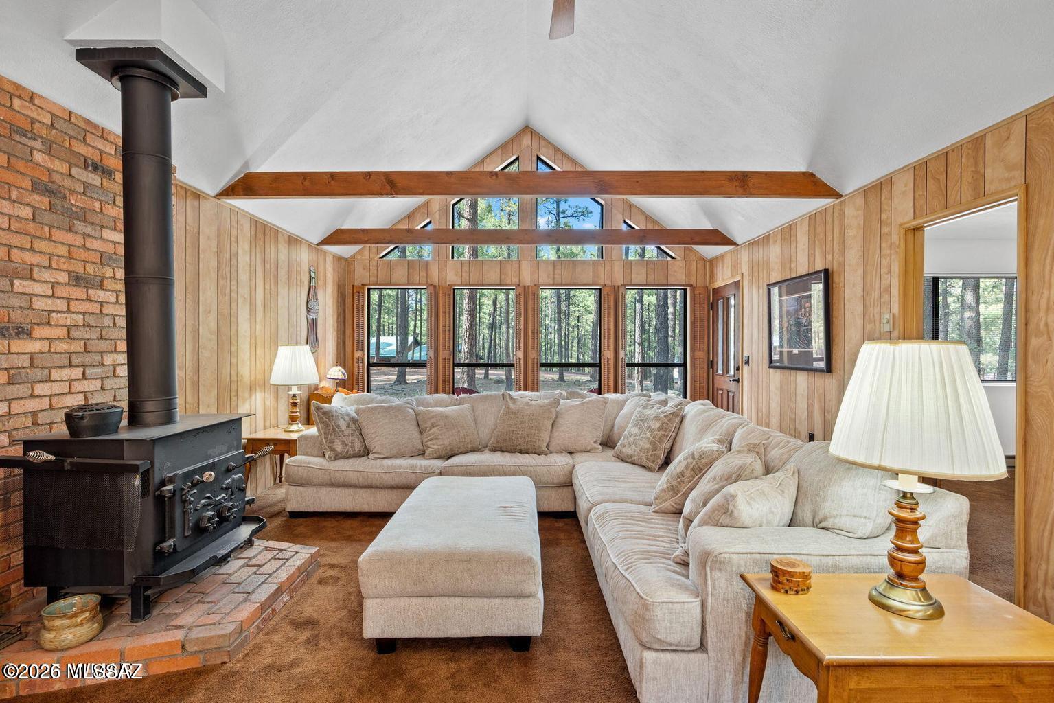 Lovely mountain cabin nestled in the trees along with decks to relax and enjoy the outdoors and mountain air. The beautiful A-frame windows provide perfect viewing from the Great Room. Detached 12x20' 1-car garage with side door and window, and power and numerous electrical outlets. New floors in kitchen and bathrooms. All appliances are new within last 2 years.