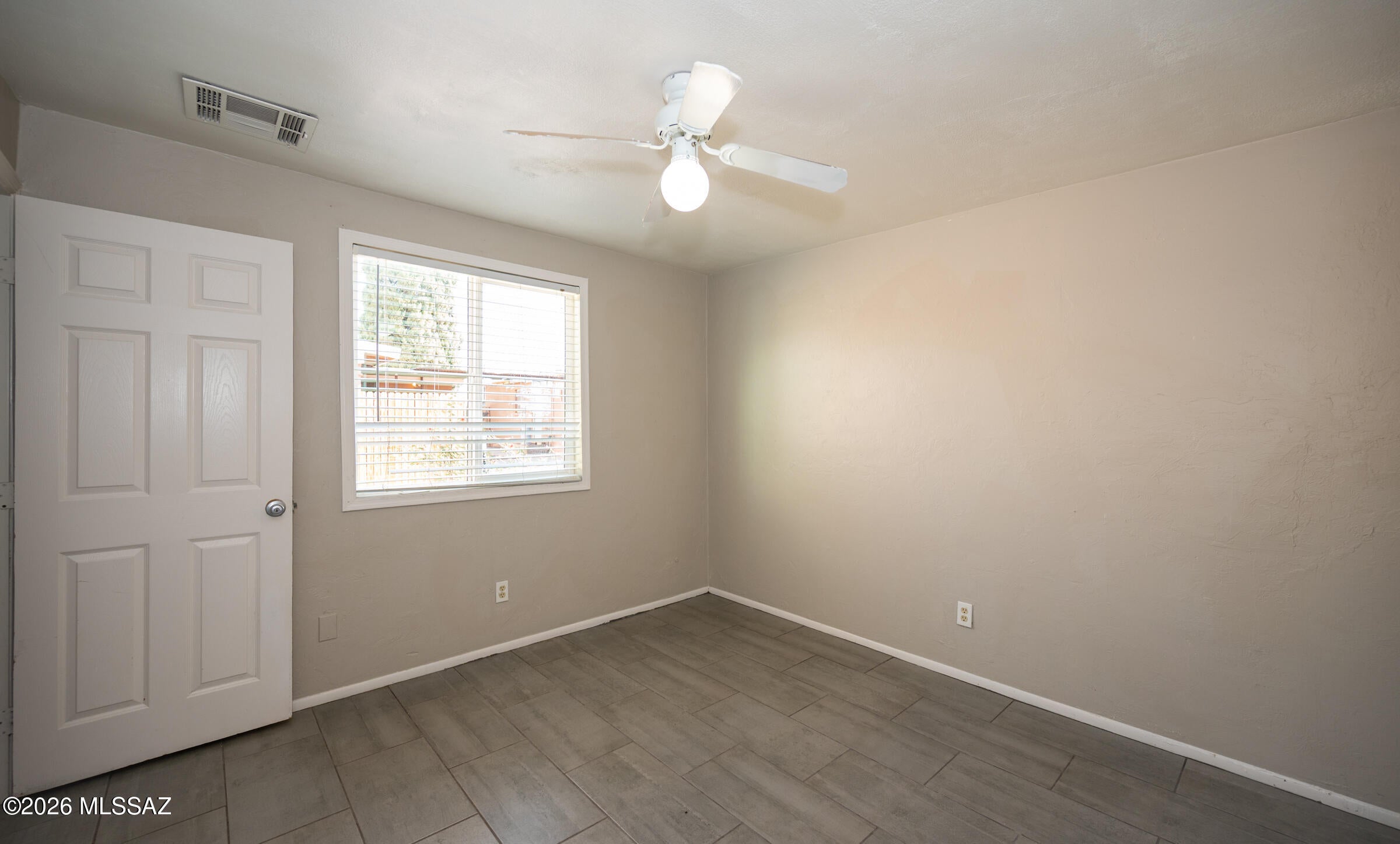 Cozy 2nd bedroom and 1 full bath. Near the U of A. No carpet, hardwood floors throughout. Private yard with shared laundry. Parking spots available. Water included. $1200 rent, $1200 Security deposit, $150/pet with approved pet.