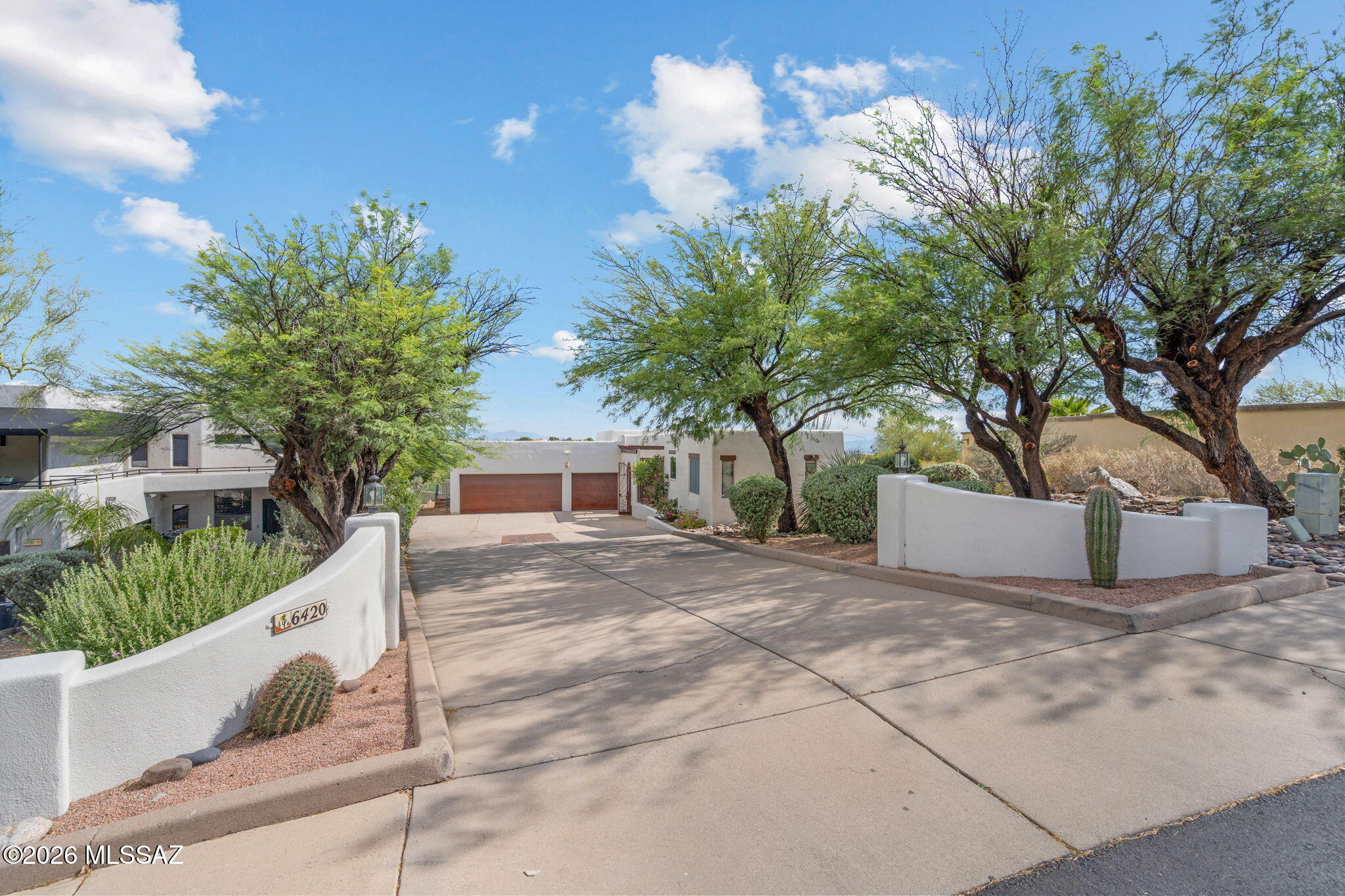 SELLER OWNED SOLAR. Nestled in the prestigious Regal Manor Estates of the Catalina Foothills, this updated 3,324 sq ft residence offers 5 bdrms, 3 bathrooms, lg separate family room, sparkling pool & 3 car garage - all framed by sweeping mountain & city views. Basketball court on premises. HIS & HER'S CLOSETS Every corner of this home has been thoughtfully updated. The custom kitchen features NEW cabinetry, NEW SS appliances & granite countertops. New Electrical Panel, NEW hot- water heater, new EcoWater softener, reverse-osmosis purifier & new LED lighting throughout. Freshly recoated roof w 5 yr WARRANTY. Exterior repainted.  Catalina Foothills District, minutes from shopping and restaurants. Full list of upgrades is under documents.  A must see. $0.00 May Electric Bill