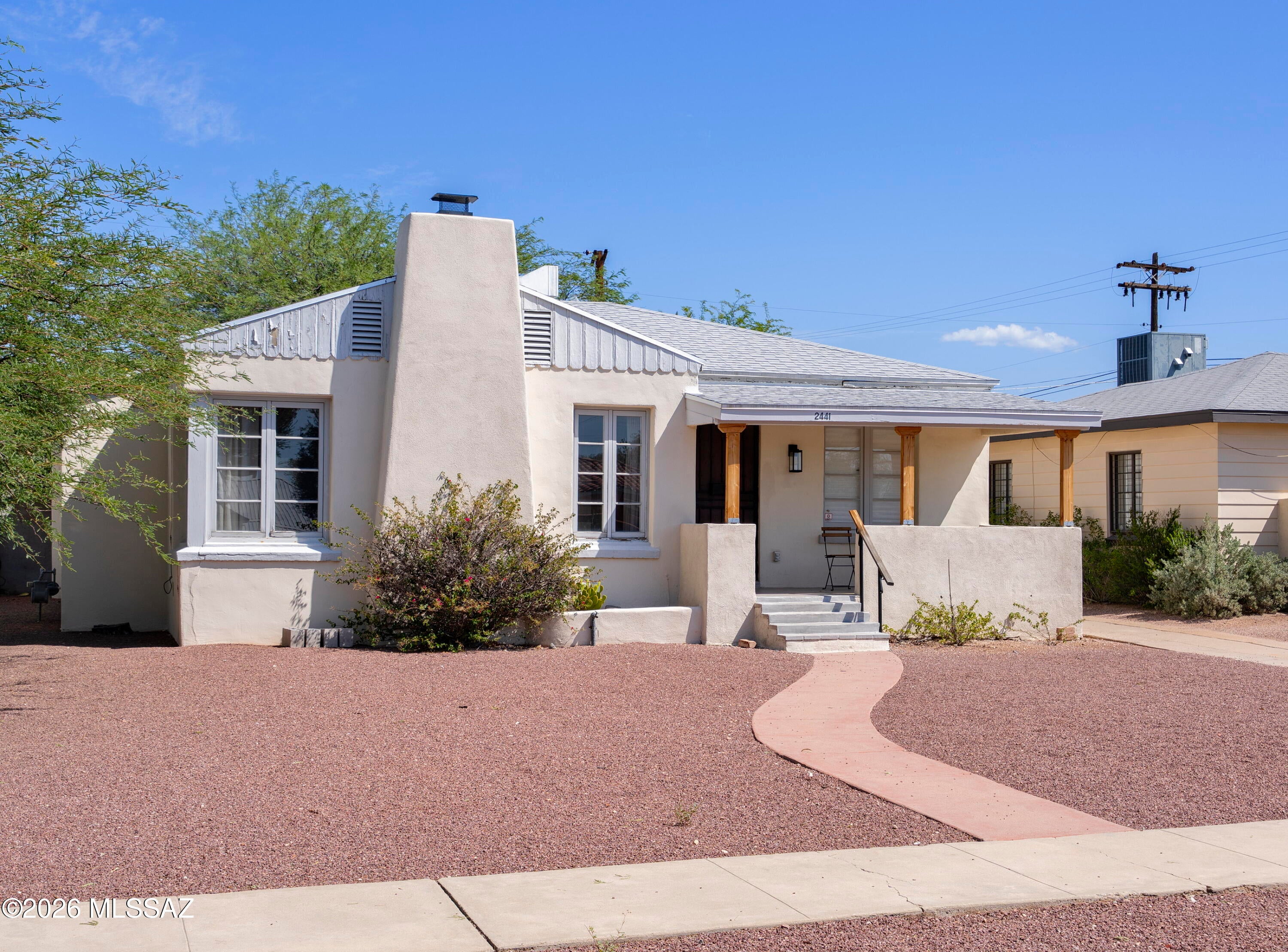 Located in the highly desirable Sam Hughes Historic Neighborhood, this charming 2-bedroom, 1-bath bungalow offers 1,353 sq ft of character and thoughtful updates. Tastefully remodeled throughout, the home features a beautifully refreshed kitchen with new cabinetry and countertops, fresh interior paint, new HVAC, and complete re-plumbing. Original charm shines through with natural hardwood floors, a cozy fireplace, spacious living and dining areas, and a versatile Arizona room. Enjoy the private backyard and easy-care landscaping. An unbeatable location close to the University of Arizona, Himmel Park, neighborhood restaurants, and local favorites--everything Sam Hughes is known for is right outside your door.