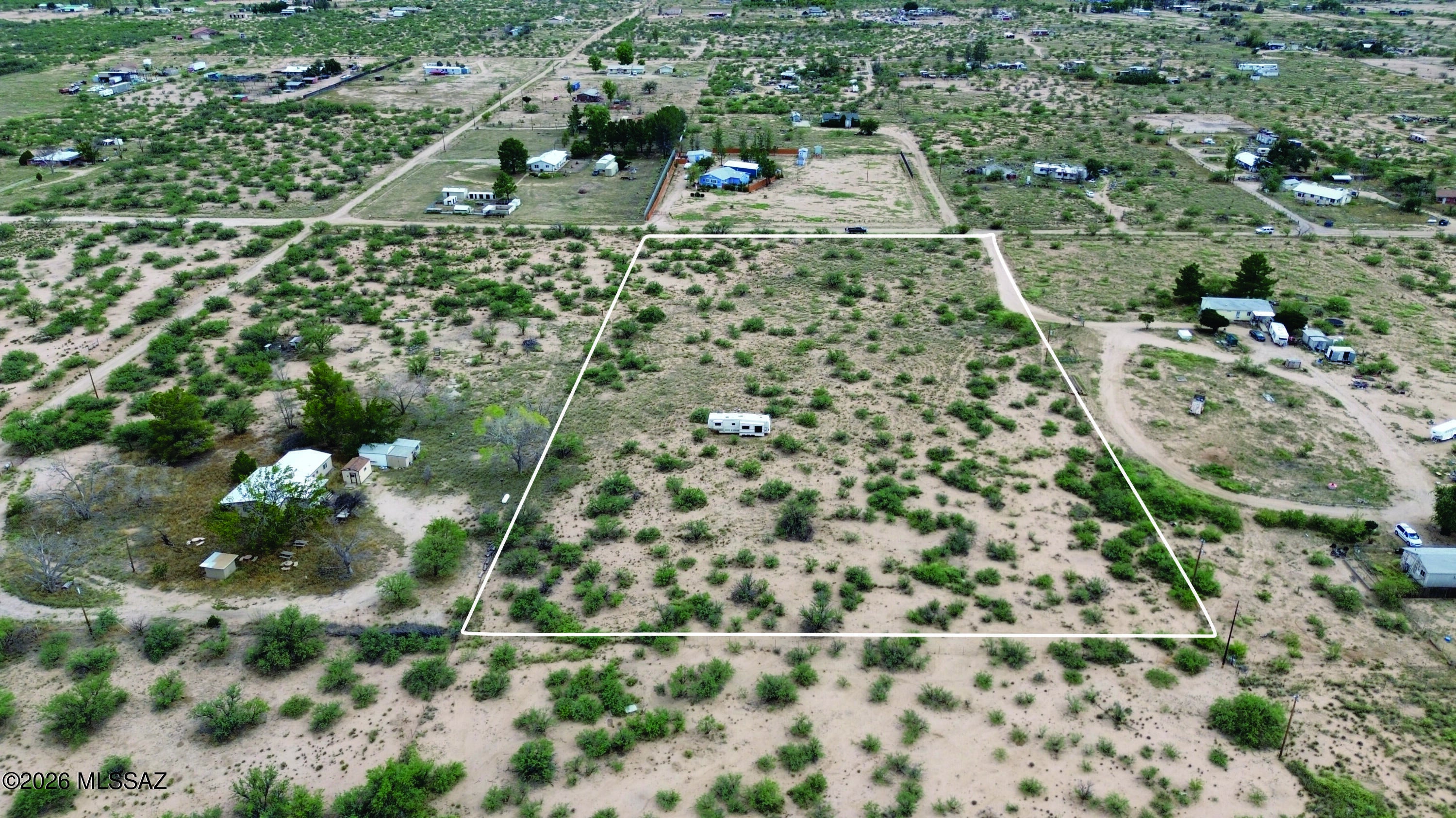 Beautiful 5 acre property with 360-degree views. Sit and look up at the Cochise Stronghold or out at the Chiricahua Mountains. Short drive to Willcox or Benson for shopping. Close to all of the Cochise County historical location suck as Tombstone or Bisbee. Plenty of hiking close by.  RV on property does not convey, buyer may make offer on RV separately. Seller financing is available with $4900 Down plus Pioneer Title account setup and closing Costs, for 4 years at 9.9 percent interest. with a payment of $278.46 per month plus Pioneer Title Processing fee and impounded property tax.