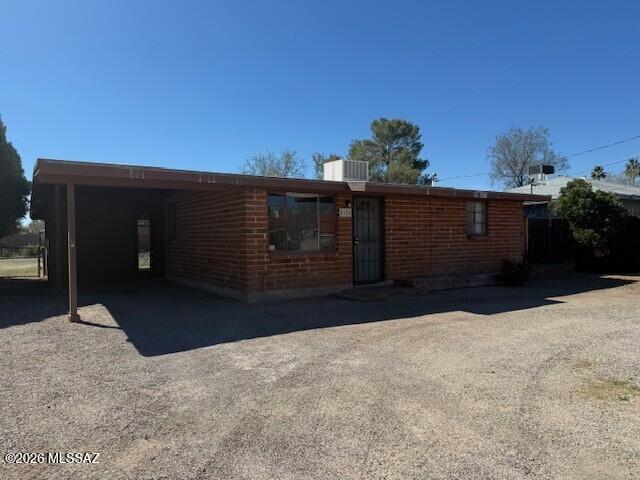 Adobe House on large lot in great Central location!  2 Bdrm/1 Bath, with all tile flooring, pine wood paneling, and covered patio in rear - large fenced yard.  Evaporative Cooling, central gas heat.  Pets considered subject to owner approval.  Listing Broker related to Owner.