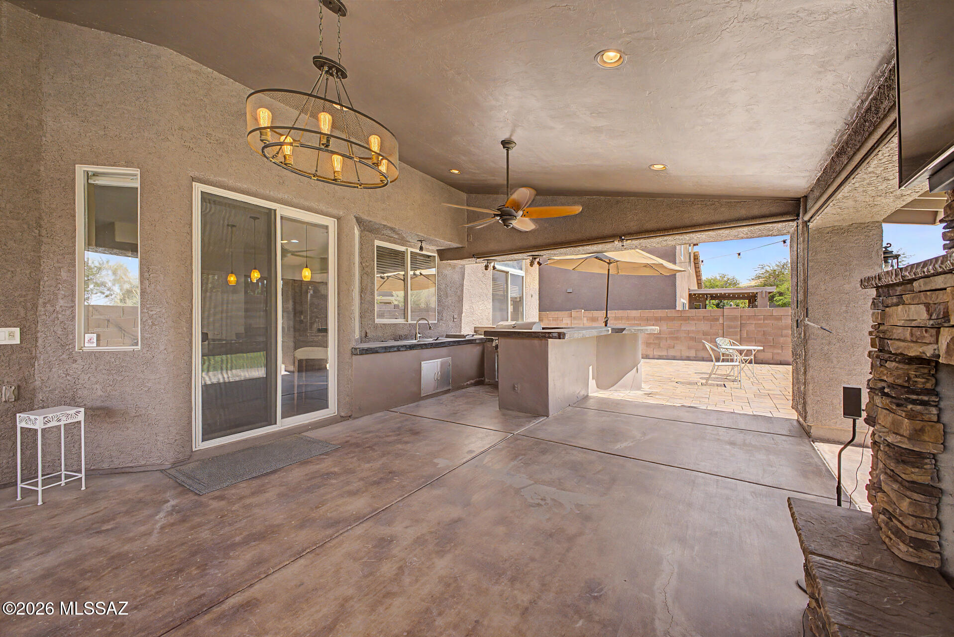 Welcome to your new home where everyday living meets entertainer's paradise. Nestled within the gated community of Rancho Agua Dulce on Tucson's scenic West side, this stunning home offers comfortable & well-maintained living space. Step inside & immediately appreciate the timeless ceramic tile flooring that flows throughout the main level, complemented by a warm & inviting kitchen featuring classic granite countertops & a gas double oven, perfect for culinary enthusiasts. Upstairs, plush carpet & two full bathrooms provide a peaceful retreat, while a convenient powder room on the main floor adds everyday ease. But the true showstopper? Step outside into your own private backyard oasis. The meticulously maintained grounds set the stage for an entertainer's dream, complete w/ fully equipped outdoor kitchen & gorgeous fireplace that makes every gathering unforgettable, whether it's an intimate evening under the stars or a lively weekend cookout.
This is a short sale opportunity. Bring your vision & make this well cared for home your own.