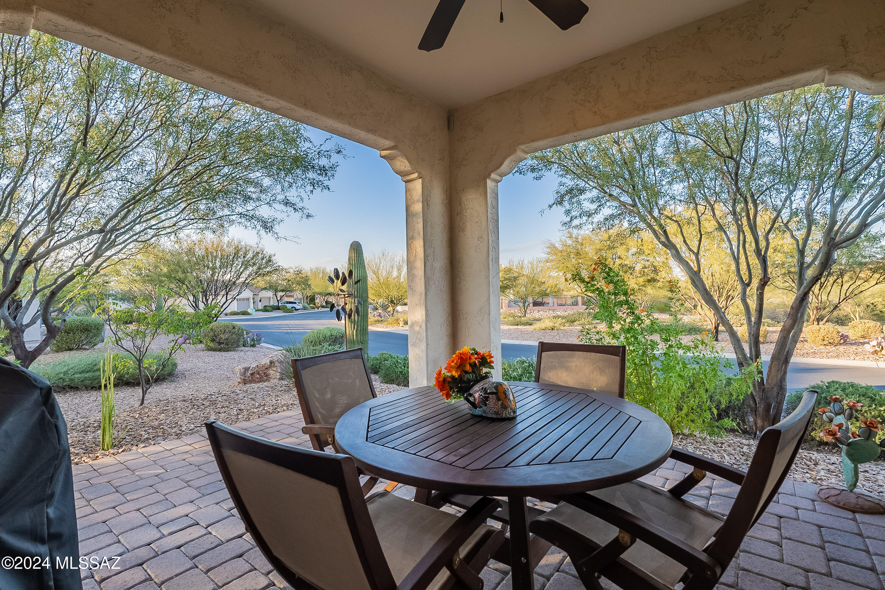 Looking for a park-like setting in the desert? You have found it! A spacious greenway, a corner lot, and surrounding common area make for privacy and nature in your backyard. Used only six months every year, this Lariat Villa is 1529sf, has 2BR, 2BA, a den (w/Murphy bed/desk), a dedicated dining area, and an open great room and kitchen to make the perfect floorplan. Villas are no longer built, so you'll have a coveted property if you ever decide to sell. Extras include soft closing cabinets/drawers, quartz countertops in the kitchen and baths, 3 solar tubes adding extra daylight, fans throughout, the extended, paved patio, garage w/ storage and epoxy floor, water softener, gorgeous new front door, fresh interior paint, & low-e Milgard windows. Lock & Leave never felt so good!