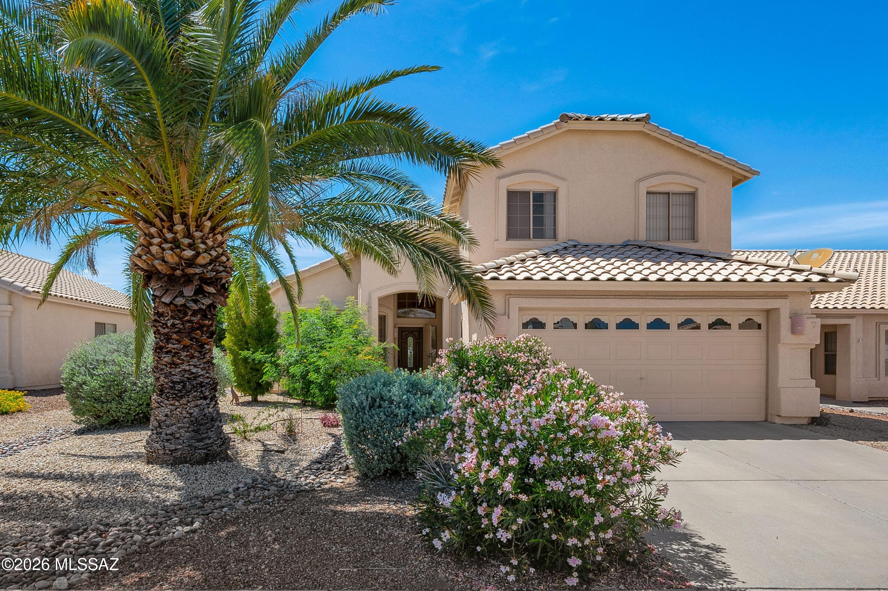 LOWER YOUR MONTHLY PAYMENT! Seller Offering up to $5,000 Toward Buyer Closing Costs or Interest-Rate Buy-Down w/ Acceptable Offer! Move-In Ready Home w/ Main-Level Primary Suite, 2.5-Car Garage & So Many Upgrades! Excellent Layout w/ Formal Living & Dining Spaces & Open-Concept Family Room & Kitchen. New Flooring Throughout - No Carpet! Kitchen is Upgraded w/ Gorgeous Quartz Countertops, Slate Refrigerator, SS Gas Range/Cooktop, Microwave, Dishwasher & Convenient Pull-Out Shelving. Enjoy Easy Access to the Backyard Featuring Trees, Bushes, Decorative Rock & Covered Patio Complete w/ Retractable Screen. An Ideal Space to Relax & Unwind. The Primary Suite Is Located Downstairs & Offers Patio Access, a Bay Window, Soaking Tub, Separate Shower & Dual Vanity. Upstairs You'll Find a Versatile Loft w/ 2 Additional Bedrooms. A Well-Appointed Home w/ Thoughtful Upgrades - Ready for You to Enjoy!
