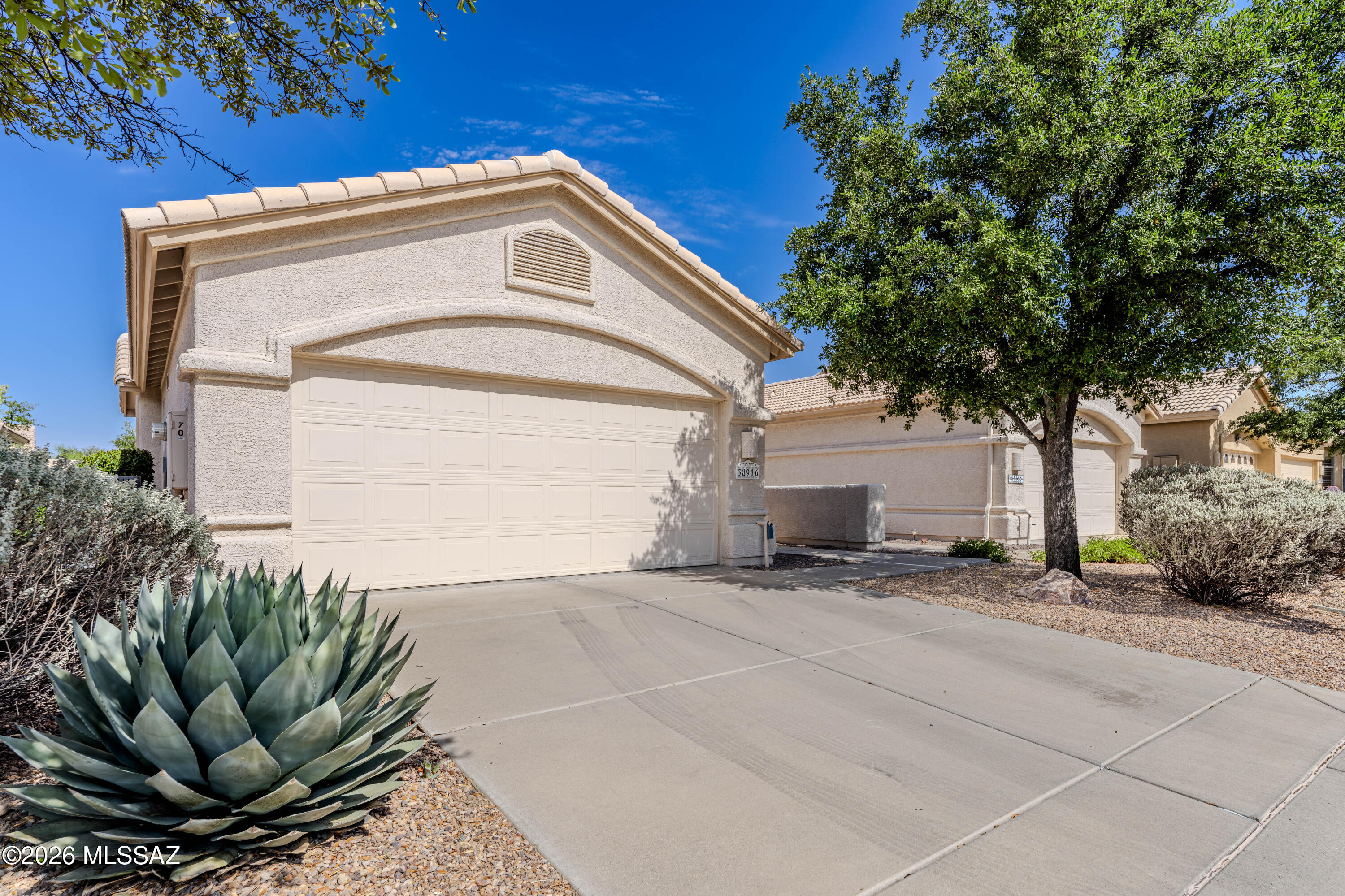 Beautiful Naples model villa in one of the area's most desirable resort-style communities! This highly sought after home features soaring vaulted ceilings and an open concept great room that flows seamlessly into the well-appointed kitchen with abundant cabinetry, a large quartz island, pull-out shelving, and SS appliances. 
The split-BR floor plan includes a spacious den and versatile bonus room, perfect for a home office or hobby space. The generous primary suite offers ample closet space, NEW ROOF, NEW HVAC! . Relax on the screened, covered patio overlooking a peaceful common area. HOA covers exterior maintenance, roof repair and replacement, drip irrigation, and blanket insurance. Enjoy exceptional resort style amenities including 200+ clubs and activities