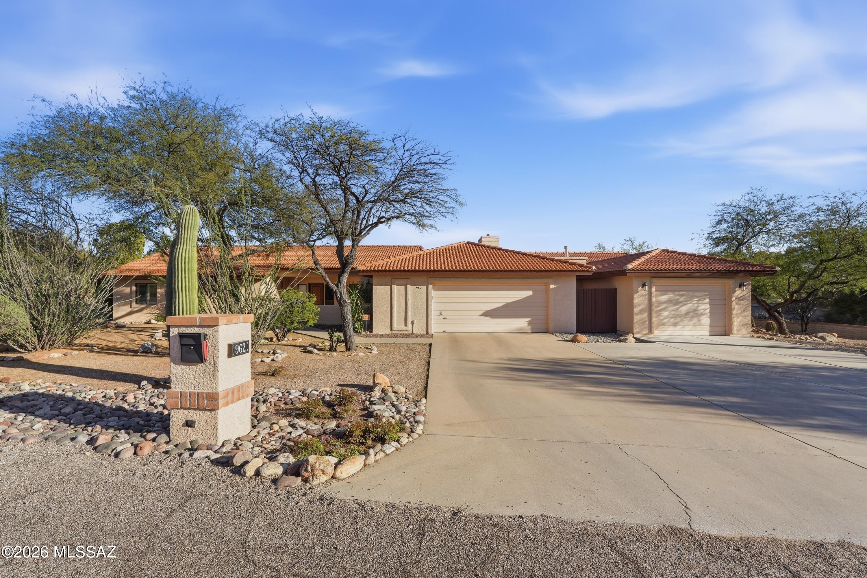 Five-bedroom home in Shadow Hills combining spaciousness, comfort, and a prime location. Renowned Catalina Foothills School District. Two master suites, ideal for multi-generational living or accommodating guests with ease. Welcoming foyer that sets the tone for the refined interior. Large living/dining areas perfect for entertaining or relaxing with loved ones. Spacious three-car garage provides ample room for vehicles, storage, and hobbies. The backyard is a true retreat, featuring a sparkling pool surrounded by landscaping that creates a beautiful oasis. Relax beneath the large, covered patio, perfect for gatherings. Breathtaking mountain views from pool area that enhance the serene atmosphere of this exceptional property.  2 new a/c units fall 2025, roof 2019. Showings start 3/19