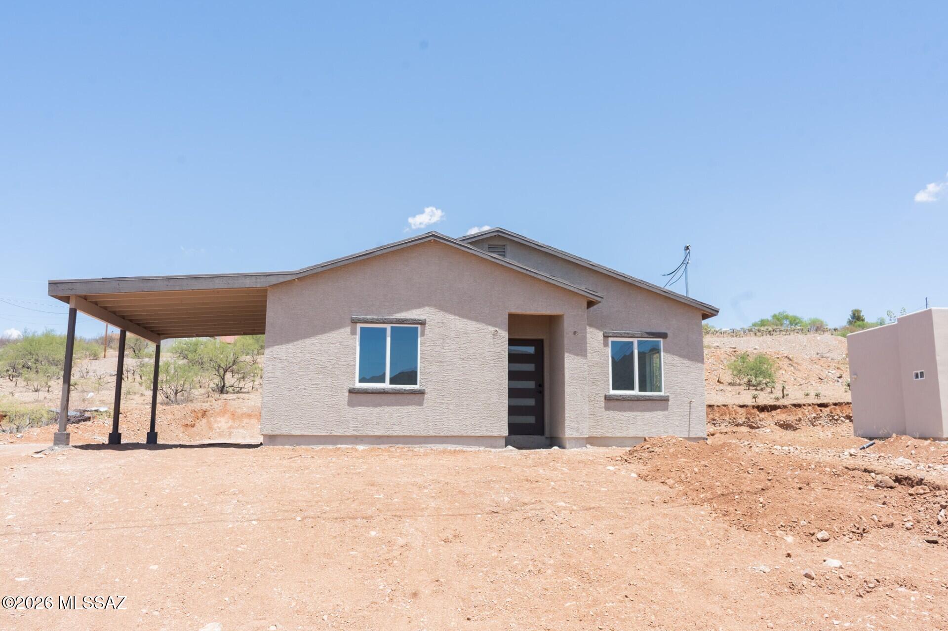 0% DOWN USDA FINANCING AVAILABLE! Brand-new 2026 home featuring 3 beds, 2 baths, and 1,368 sq ft of open-concept living on a spacious 0.24-acre lot with no HOA. A covered carport will also be added for shaded parking. Elevated for incredible north-facing mountain views and peaceful surroundings, this home offers tile flooring throughout, a modern kitchen with stainless steel appliances, and a bright layout perfect for relaxing or entertaining. Conveniently located just 5 minutes from the freeway. The oversized lot offers endless possibilities for outdoor living, storage, or future improvements. Modern finishes, usable land, and amazing views--don't miss this opportunity! Home projected to be done soon, model home nearby to view today *Pictures are from a model home and used for floor plan*