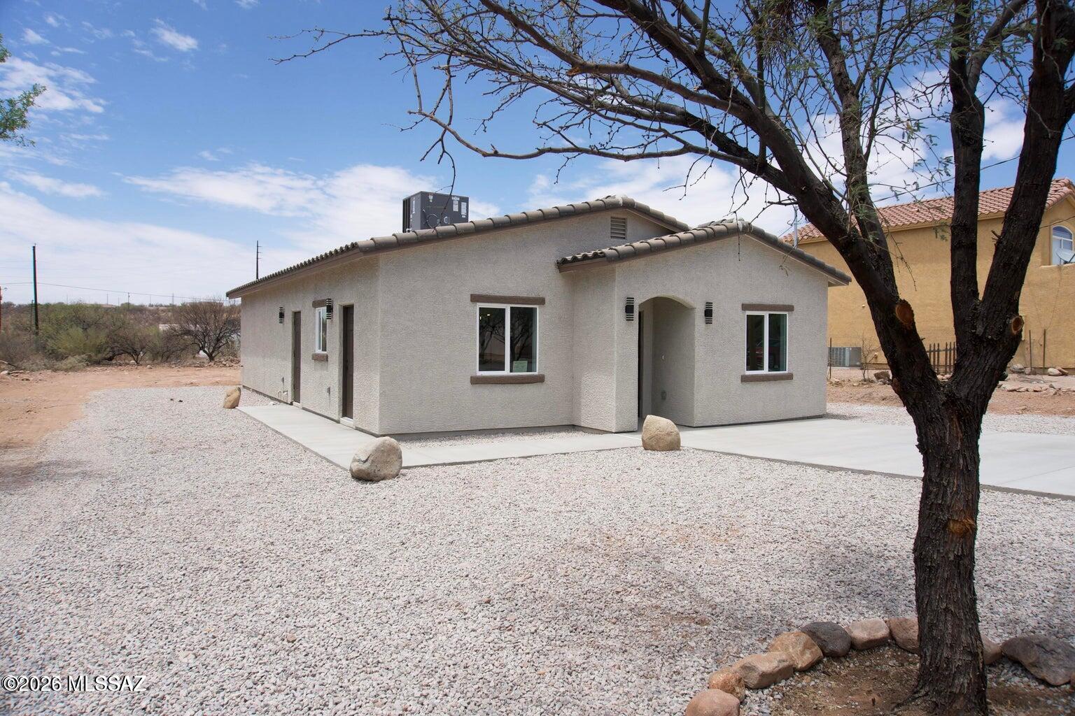 0% DOWN USDA FINANCING AVAILABLE! Brand-new 2026 home featuring 3 beds, 2 baths, and 1,368 sq ft of open-concept living on a spacious 0.24-acre lot with no HOA. A covered carport will also be added for shaded parking. Elevated for incredible north-facing mountain views and peaceful surroundings, this home offers tile flooring throughout, a modern kitchen with stainless steel appliances, and a bright layout perfect for relaxing or entertaining. Conveniently located just 5 minutes from the freeway. The oversized lot offers endless possibilities for outdoor living, storage, or future improvements. Modern finishes, usable land, and amazing views--don't miss this opportunity! Home projected to be done soon, model home nearby to view today *Pictures are from a model home and used for floor plan*