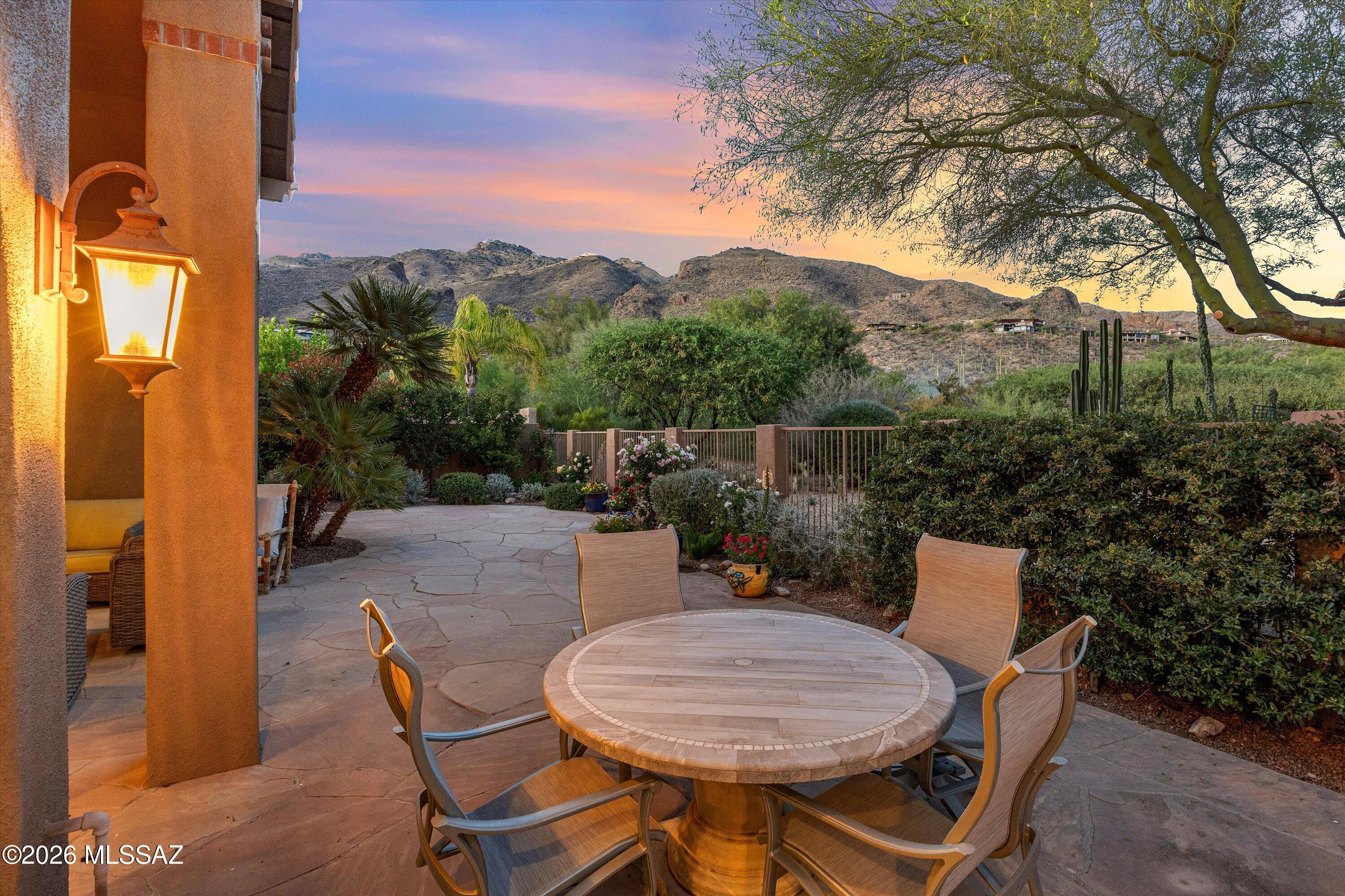 Welcome to your dream home in the heart of prestigious Ventana Canyon CC community, where luxury meets  tranquility on a premier golf course lot. Stunning three-bedroom, three full bath David Baird designed home offers views from every window. As you approach, you're greeted by a beautifully landscaped oversized driveway leading to welcoming entryway. Step inside to find soaring ceilings & spacious living room, highlighted by a magnificent feature window that frames breathtaking mountain views. Gorgeous custom & hand carved doors & impeccable built in features add to beauty. Large gourmet kitchen boasts lovely wood cabinetry, ample prep, storage & counter space, perfect for culinary enthusiasts. Primary suite is a serene retreat, featuring a wall of windows open to lush backyard. Its remodeled en suite offers the epitome of luxury with heated floors, dual vanities, a built-in dresser & a separate vanity station. Each additional bedroom also includes remodeled en suites, providing comfort & privacy for all.
The backyard is a private oasis set against the backdrop of multiple Canyons. Featuring beautiful Flagstone pavers & a built-in barbecue, ideal for entertaining with a view of the majestic mountains & desert landscape. Impeccable landscaping, enhanced by a new irrigation system, envelopes the property, complemented by recent upgrades including a new HVAC system, water heater & fresh exterior paint. This one-of-a-kind, meticulously maintained home offers an exquisite lifestyle in one of Tucson's most sought-after locations.
Close to schools (District 16), Sabino Canyon, restaurants, shopping, recreation, golf, pickleball & more.
Ventana Canyon Country Club Memberships available (Social Racquet & Golf). See attached information.