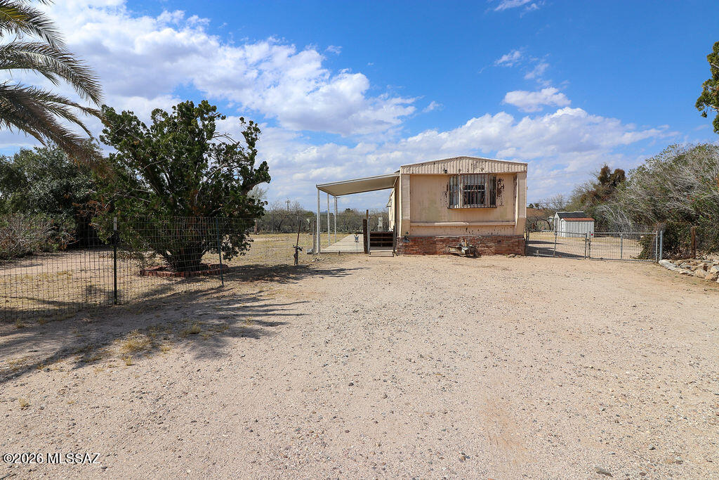 Fantastic opportunity for anyone looking to invest or start a business! This lot has multi-use zoning which can be used for both residential and commercial. Located in the heart of Tucson, less than 5 minutes from Oracle and comes with an unaffixed, 3 bed 2 bath manufactured home. Manufactured home also includes unpermitted addition which adds even more square footage. Sitting on a corner lot that is over .33 acres, this property offers endless possibilities. Come see it before it is too late, it will move fast! **The unaffixed mobile home currently on the premises shall convey AS-IS with no additional value added. Title(s) to the home shall be provided to escrow company prior to close of escrow and transferred to the buyer in conjunction with this sale. All liens against the mobile home shall be paid off in full prior to close of escrow. Personal property taxes shall be prorated through close of escrow. **
