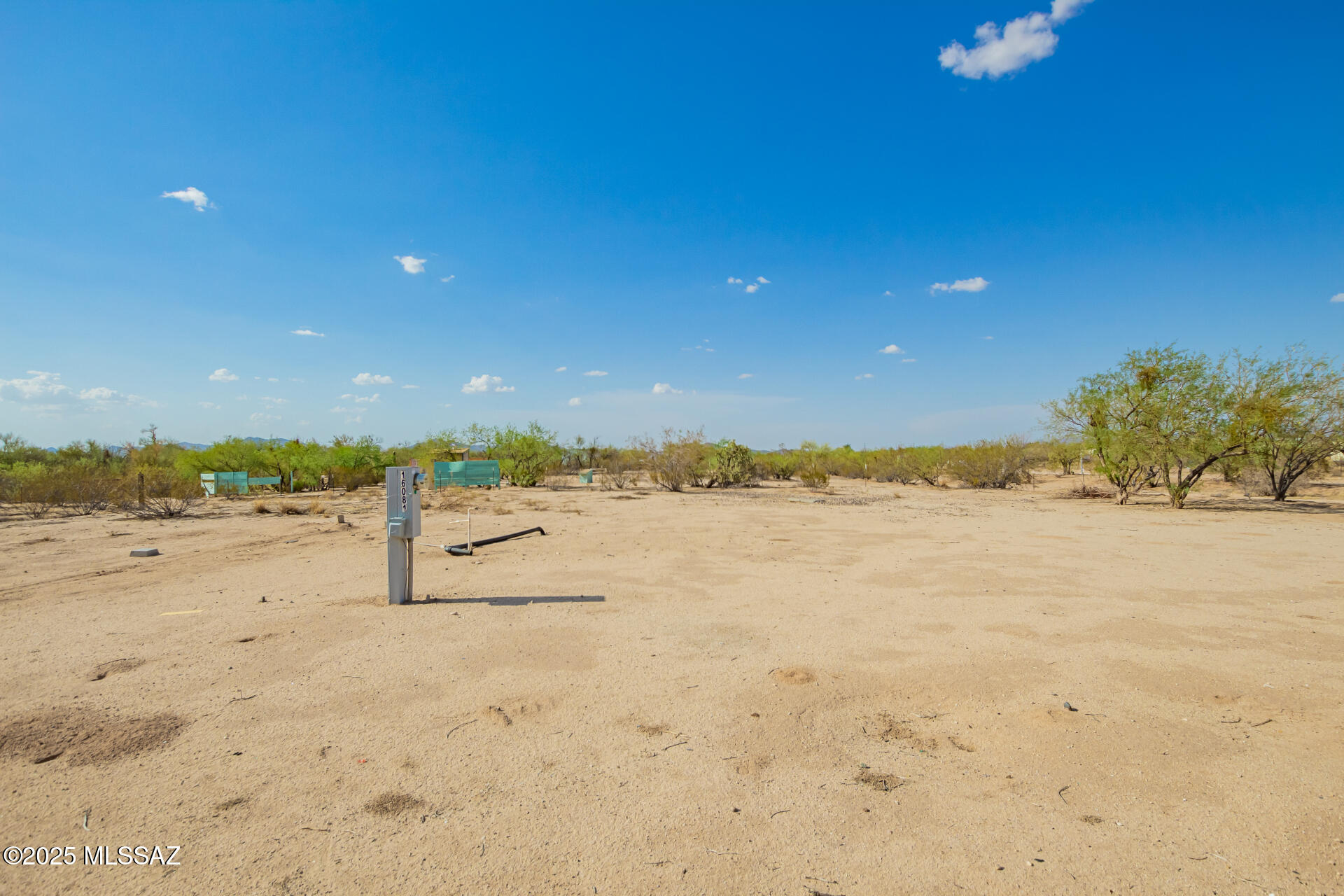 MOTIVATED SELLER! 1 Acre Lot with Utilities & Stunning Mountain Views - Ready to Build! Easy qualify Seller financing available with 15% down. Owner/Agent Listing agents have financial interest in the property