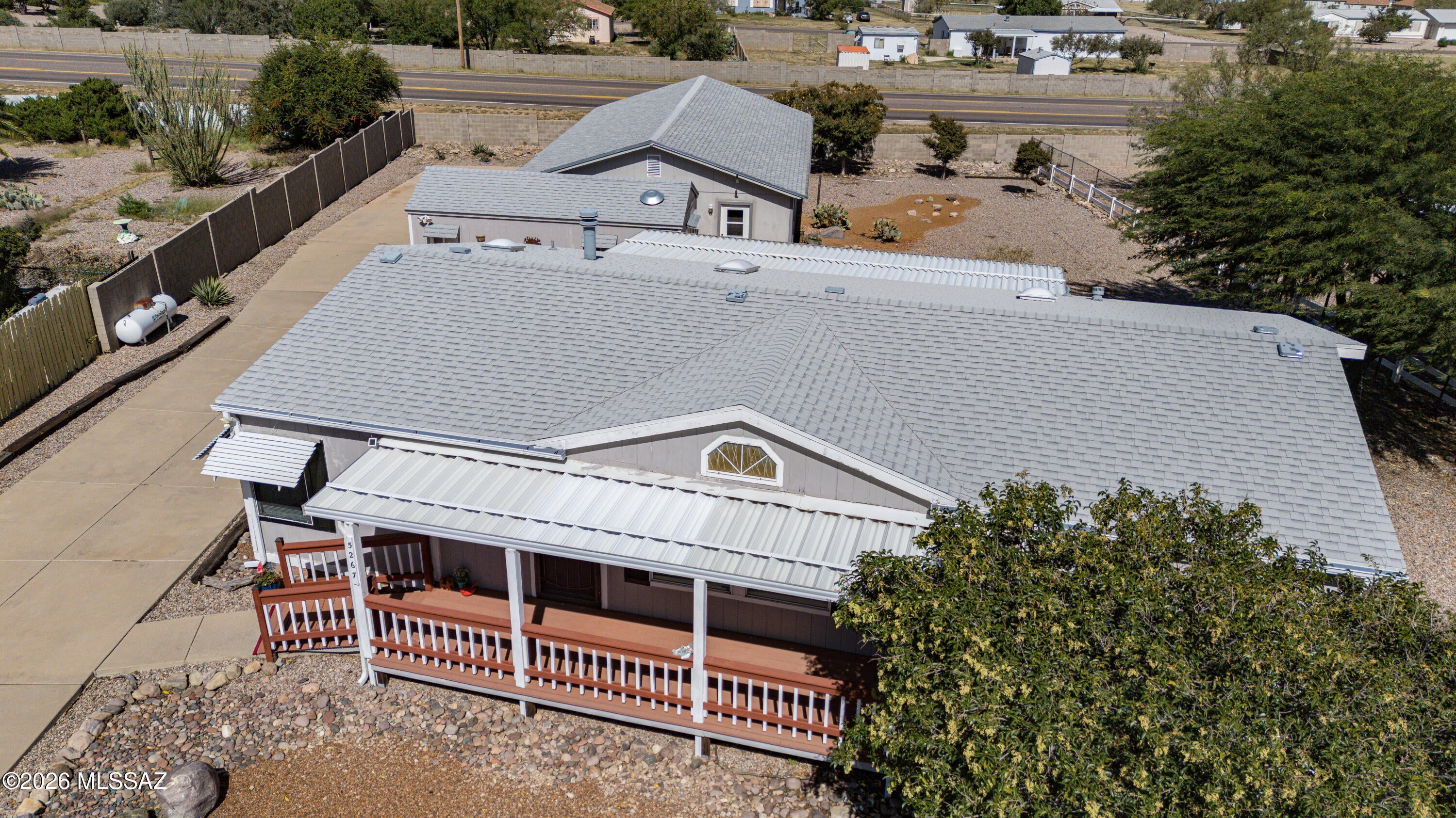 2-bedroom, 2-bathroom home with a versatile den that could easily serve as a 3rd bedroom. Features a huge oversized 4-car garage/shop, additional sheds, and a studio shed for extra space or your hobby space. Enjoy covered front and back porches with beautiful mountain views. The home has a 4-year-old roof and a full RV hookup, making it ideal for RV owners, hobbyists, or anyone needing plenty of storage and workspace.