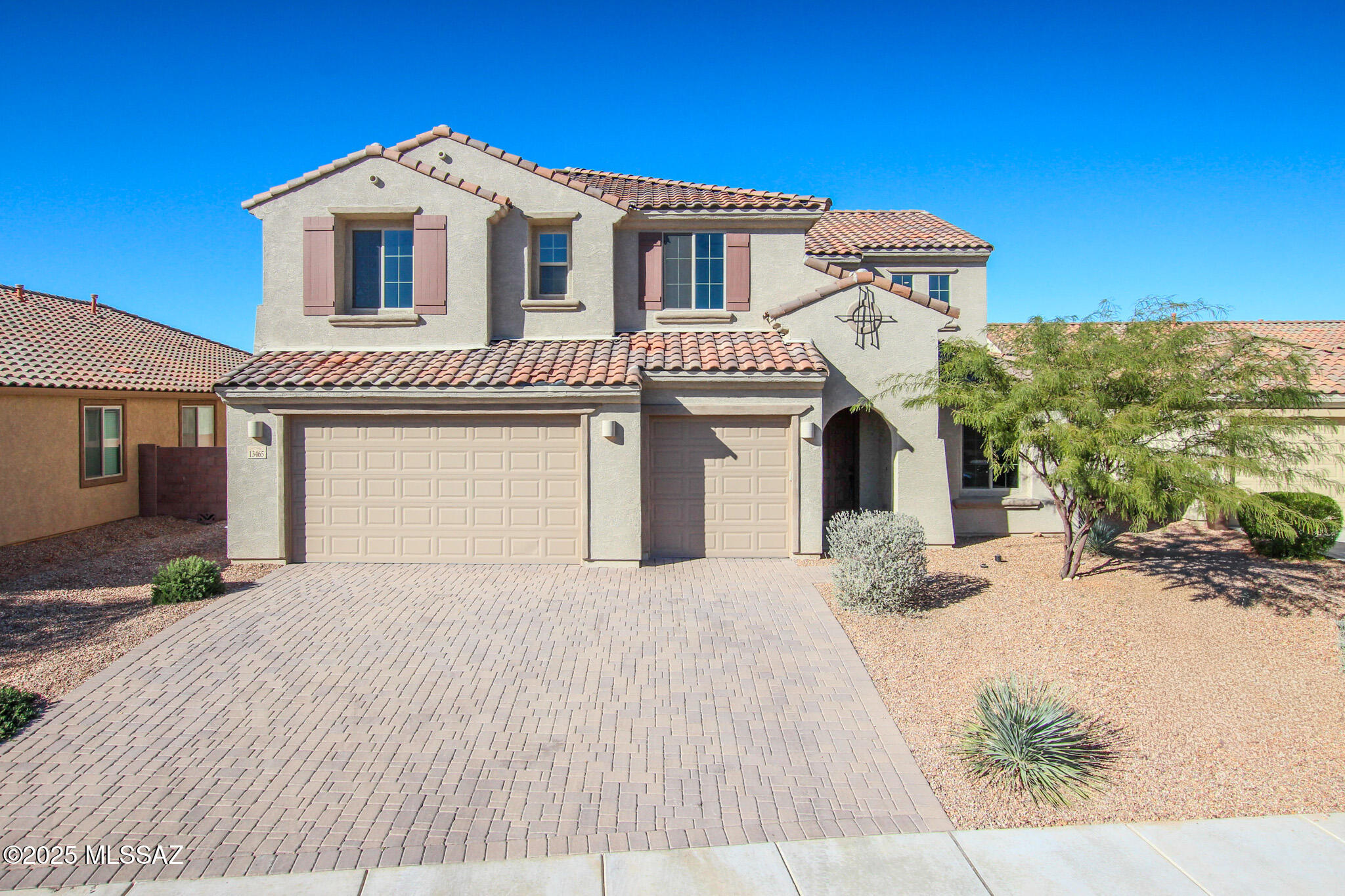 Move-in ready and highly upgraded! This spacious 6 bedroom + den Messina floor plan is designed for comfort, flexibility, and entertainment. Thoughtful upgrades include a downstairs guest suite, extended rear living space, surround sound wiring, tankless water heater, granite kitchen countertops, 8' interior doors, and a sound-dampened den—perfect for work or relaxation. The beautifully finished backyard offers artificial turf, pavers, covered patio, and workshop/storage. Fresh interior paint, plush new carpet, huge pantry with built-ins, and a generous primary walk-in closet complete this fantastic home. Don't miss it!