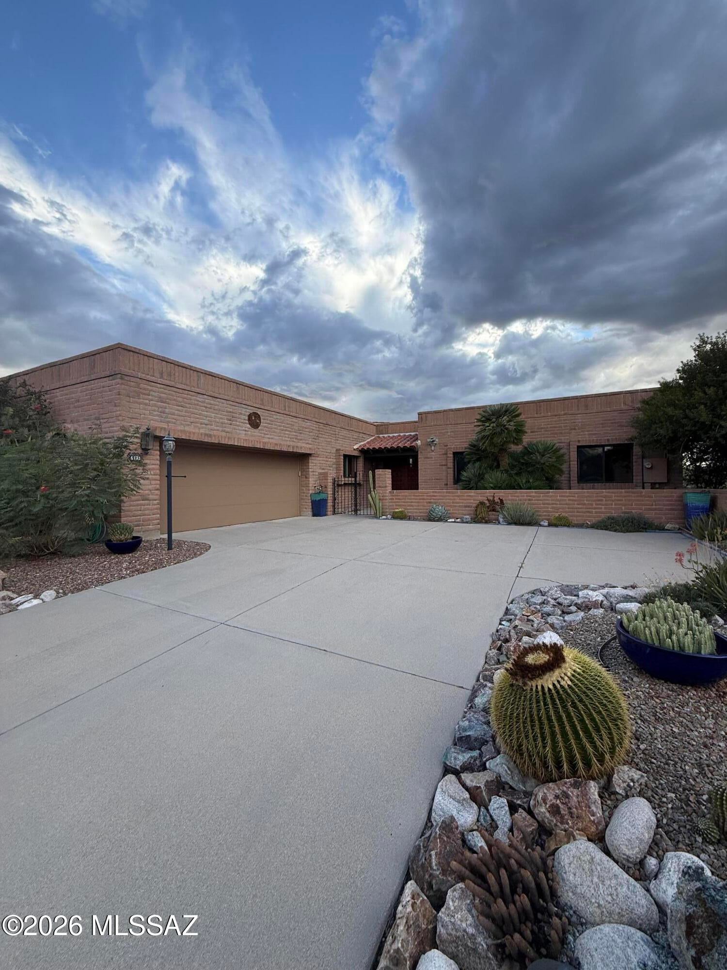 Welcome to Fairfield in the Foothills-one of Tucson's most sought-after communities! Surrounded by lush natural desert, stunning city lights & sunset views. Mountain views to the north create a breathtaking backdrop that captures the true essence of elevated Sonoran Desert living. This well-cared -for home seamlessly blends Southwest character w/a welcome touch. High ceilings. The 3 bdrm floorplan offers a separate family room in addition to the living & dining rooms. The covered patio is perfect for indoor/outdoor living. Foothills living at its finest.
Enjoy your very own grapefruit tree. This vibrant community offers 2 pools, spa, tennis & pickleball, and bocce ball. Restaurants, shopping, endless hiking nearby. New tile roof 2026, New ceiling fans 2026, New Trane HVAC-2022