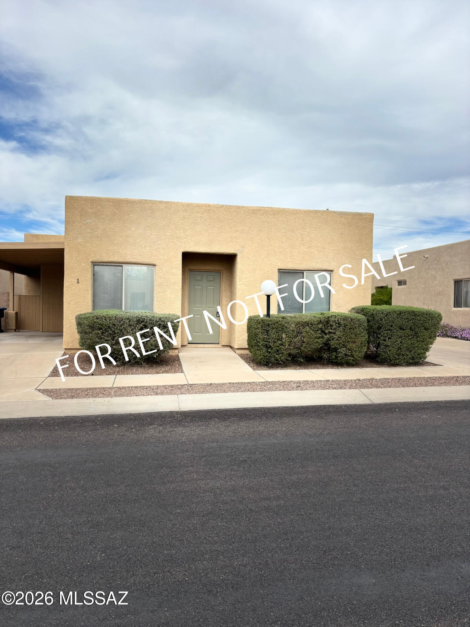 Built 2001 - 2 BED 2 BATH 996 SQ. FT.  Charming duplex located on the East Side of Tucson. This inviting unit features a welcoming floor plan with high ceilings that create a bright and open living space. The sizable kitchen includes a cozy eat-in dining area and comes fully equipped with brand-new white appliances. Appliances included: refrigerator, electric stove/oven, microwave, and dishwasher. A washer and dryer are also conveniently included in the unit for added comfort and ease. Enjoy spacious bedrooms with walk-in closets, providing ample storage. The primary bedroom offers private access to a gated patio, the perfect spot to relax and enjoy some fresh air. Additional highlights include one covered carport space and water/sewer services included in the rent. Convenient shopping, public transportation, parks and entertainment. Pets are subject to approval. 

**Please visit our website for SECURITY DEPOSIT AMOUNT AND OTHER FEES.*