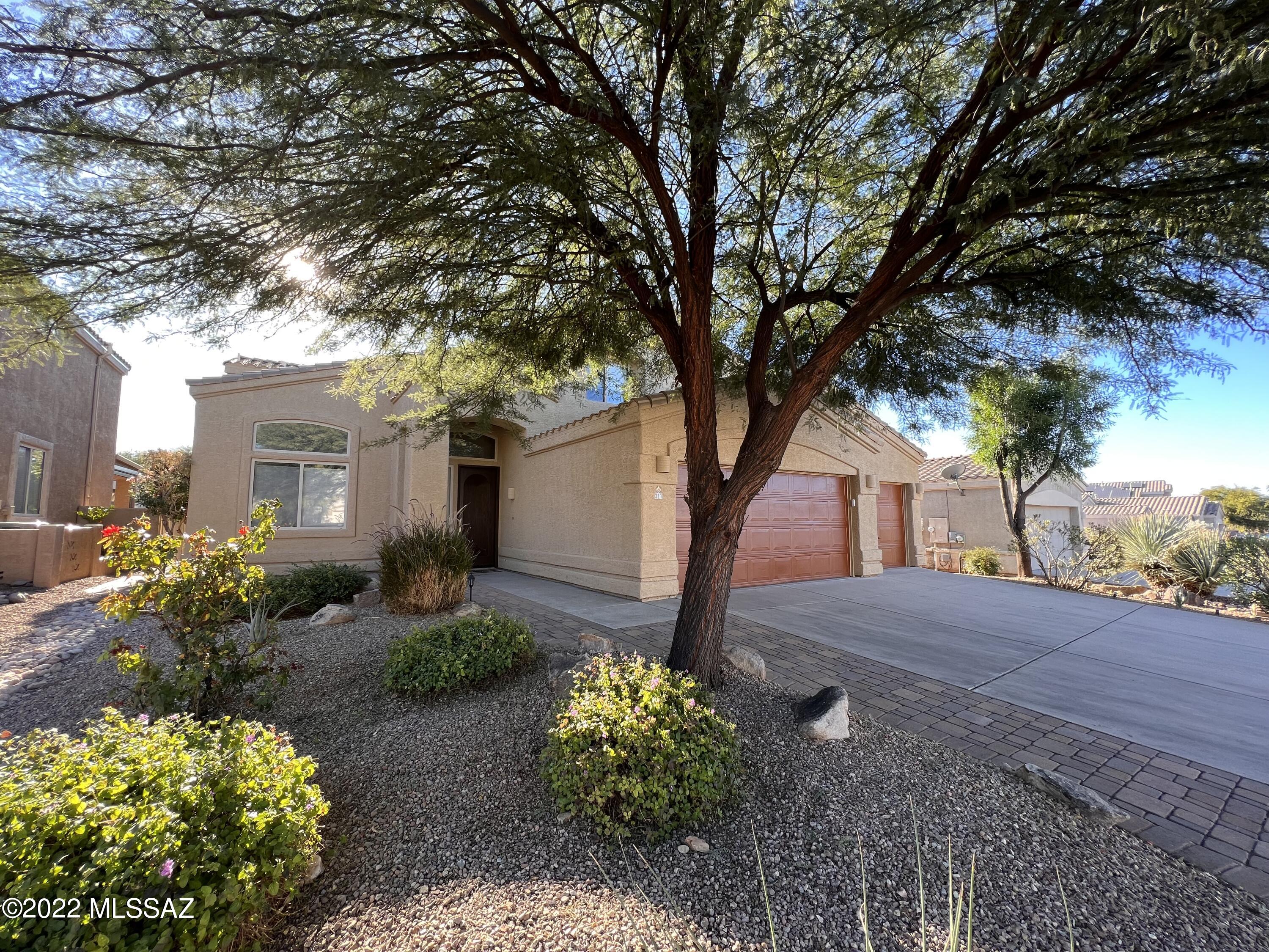 Fabulous 5bdr/3ba home in the heart of Oro Valley!
Split bedroom floorplan offers primary and three bedrooms upstairs with bedroom 5 and full bath downstairs!
Gourmet kitchen w/granite counters, stainless steel appliances, double ovens, pantry, small appliance pull-out and much more!
Stunning formal living room w/cathedral ceilings and spiral staircase.
Formal dining area just off kitchen, family room w/fireplace, casual dining area and  bar seating.
Spacious primary bedroom w/patio access offers mountain views to sit out and enjoy our Tucson nights.
Three car garage, extra storage under stairs, laundry room w/washer/dryer and utility sink.
The backyard features covered patio, pavers and mature trees.
Tenant Occupied until 05/31/2026