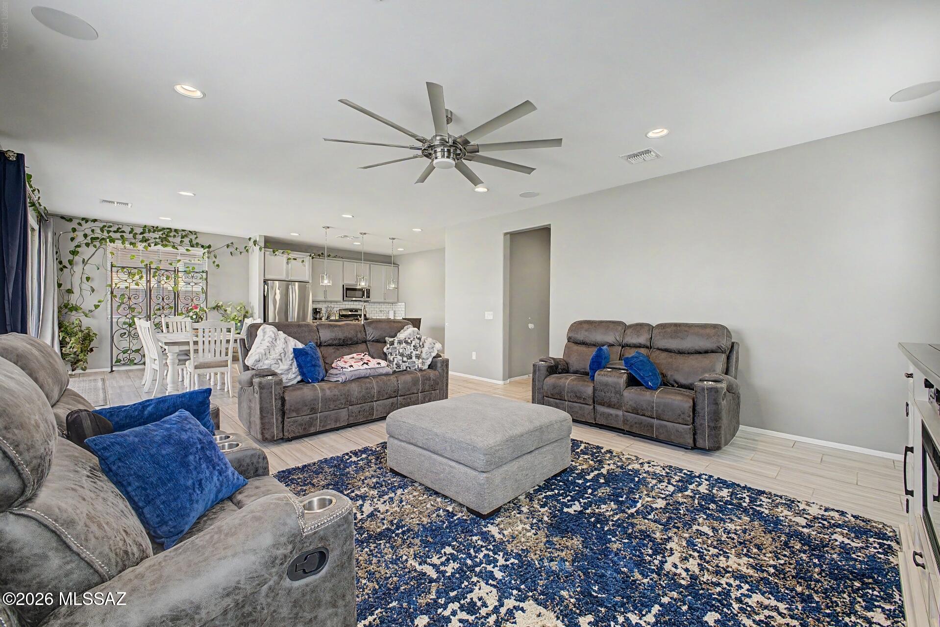 Seller will accept or counter offers between $435,000.00 to $445,000.00. Upgraded kitchen cabinets, subway tile back splash, granite countertops, formal living and dining, island seating, surround sound indoor/outdoor speakers, beautiful upgraded flooring main floor,  nice size office/den downstairs, upgraded stair railing, lighting and ceiling fans, large rooms upstairs with huge loft, master has extra windows and upgraded tile and shower door, Garage has EXTENDED HEIGHT ceiling to accommodate a truck, nicely landscaped rear yard with gazebo and firepit, epoxy rear patio, side paved pathway and turf,  nothing behind.  community:  pool, splash pad, pickle ball courts, walking trails and parks.