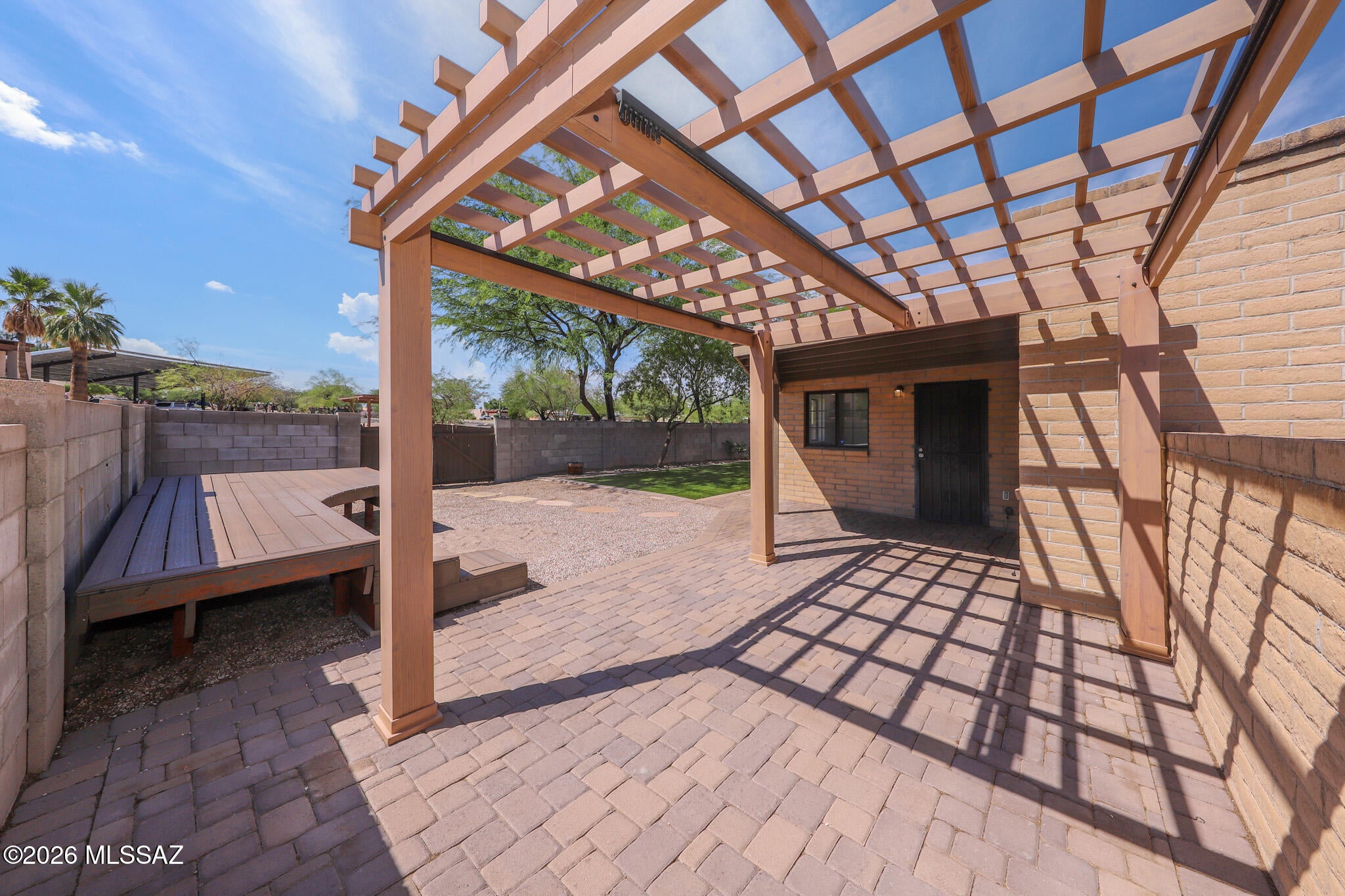 ***Move in special-$100 off months 1-3 with a one year lease. Spacious 3 BR, 2 BA home in sought-after Northeast Tucson! Features include a 2-car garage with storage, updated kitchen with stainless steel appliances and quartz counters, cozy fireplace, laundry room with washer & dryer, and a bonus room perfect for an office, hobby room, or workout space. Enjoy a large yard with mature vegetation, raised planters, elevated deck, and extended covered patio. North/south orientation. Close to Udall Park with pickleball, walking paths, classes, fitness facilities and pool, plus shopping, dining & easy access to Sabino Canyon & Mount Lemmon