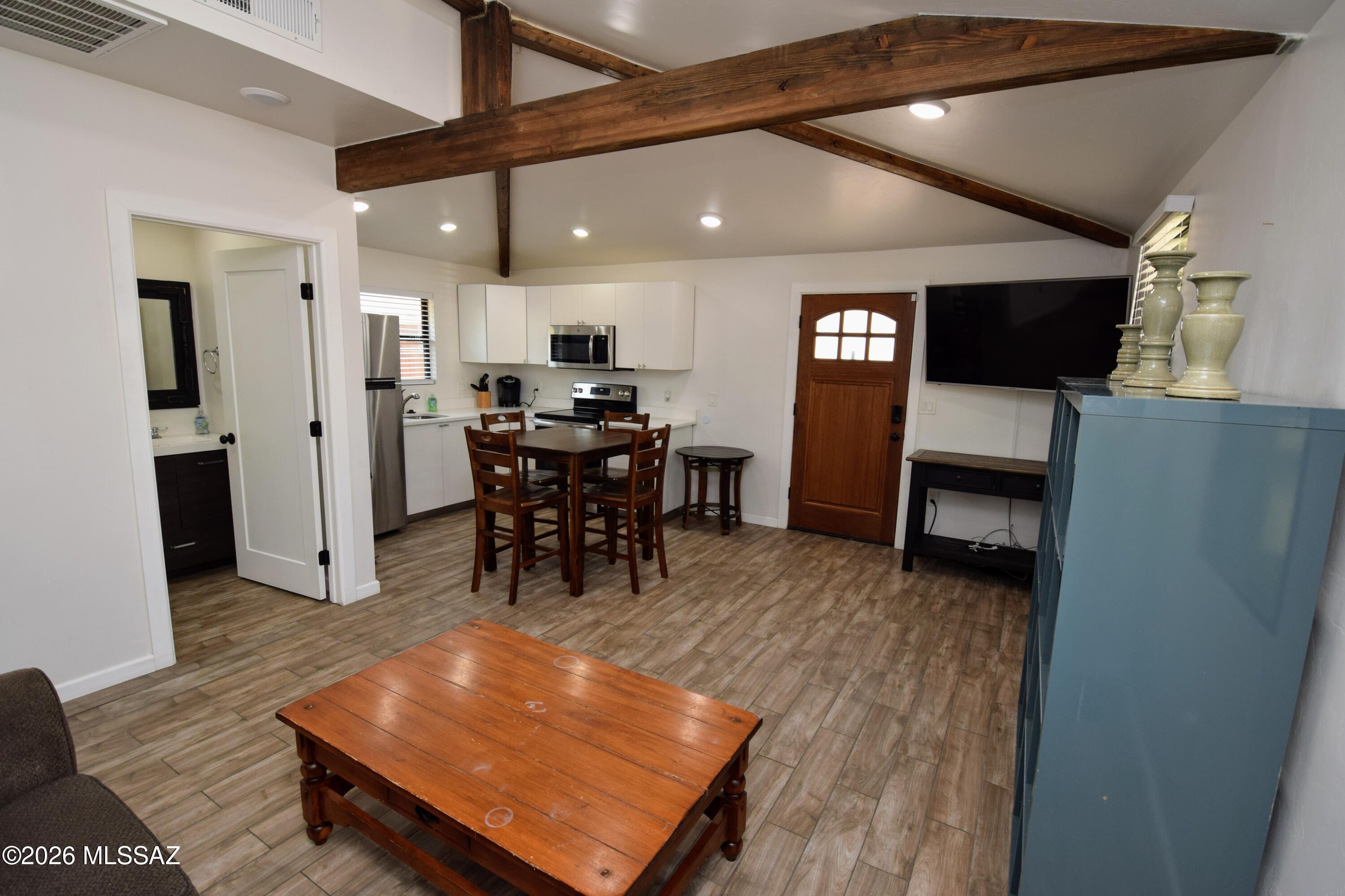 Pre-Leasing for July 2026. DO NOT DISTURB TENANTS. Showings are available with a 48 Hour Notice to the current tenants.
Furnished Modern & Renovated 1 Bed 1 Bath Stand Alone Casita - 1 Mile to the University of Arizona. 2019 Renovation included a new roof, A/C, tile flooring, LED lighting, doors, paint, trim & windows. Beautiful and bright living area with vaulted wood beam ceilings. The open kitchen has bright white cabinets, counters, and stainless steel appliances. Updated bathroom. Full-Size Front Load Washer/Dryer. The bedroom will be furnished with a Queen bed, night stands and reading lights. Enclosed yard with corrugated steel fencing. Off Street Parking. Walk or easy bike to all the food, coffee, drink, and amenities that Midtown offers in the area. Tenants will pay an additional $50 for water/sewer/trash/recycling monthly. The unit will come furnished with the items included in the photos. This home is offered as NON-SMOKING. Only service animals or qualified assistance animals will be allowed.