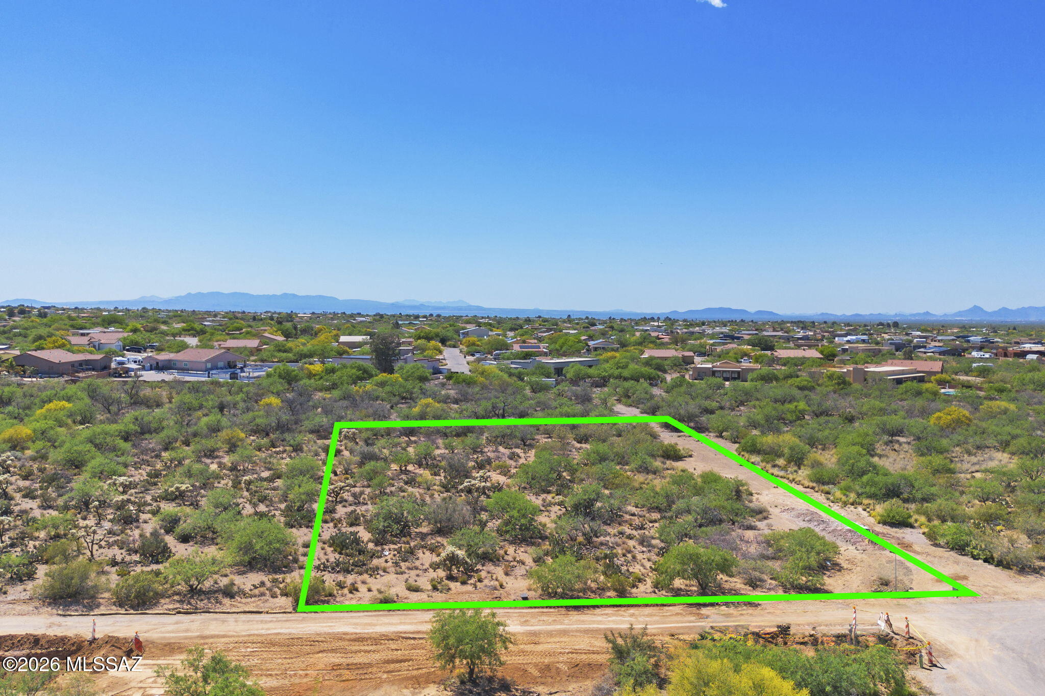 Ready to build! Flat lot on a paved road with utilities at the lot line! It doesn't get better or easier than this one. Bring your toys, work trucks, RV's, and boats, it is all allowed in this minimally restricted community. Horses are allowed as well! Gorgeous vegetation makes this lot very desirable. Take a look at this lot TODAY! The lot next door at 995 N Blue Slate is also available by the same owner. Buy one or buy both. Opportunity abounds!