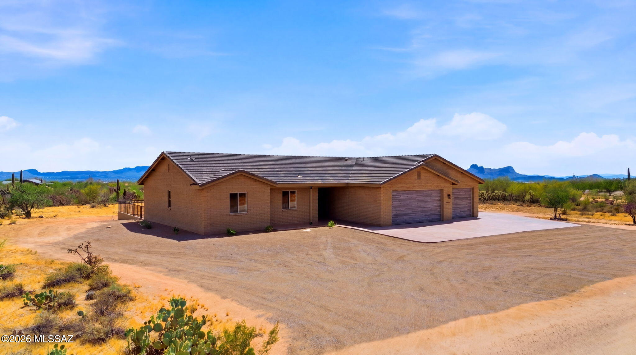 QUALITY, Brand New 4 Bed/ 3 Bath Plus DEN Masonry Construction on 4.154 Acres w/natural desert landscaping & sweeping mountain views! A 3-Car Garage + concrete driveway for extra parking welcomes you. Discover an open, airy layout featuring polished concrete flooring, vaulted ceilings, fire sprinklers, neutral paint, recessed lighting, & a fireplace anchoring the living area. Maple Cabinet Kitchen has SS appliances, abundant cabinetry, quartz counters, & breakfast bar. The main bedroom boasts sliding doors to the backyard, a walk-in closet, & a private bathroom w/dual sinks, a jetted tub, & a glass-enclosed shower. A dedicated laundry room with a sink & cabinets adds convenience! Out back, a covered patio for enjoying stunning mountain views. RV Electric at panel & Solar Ready!