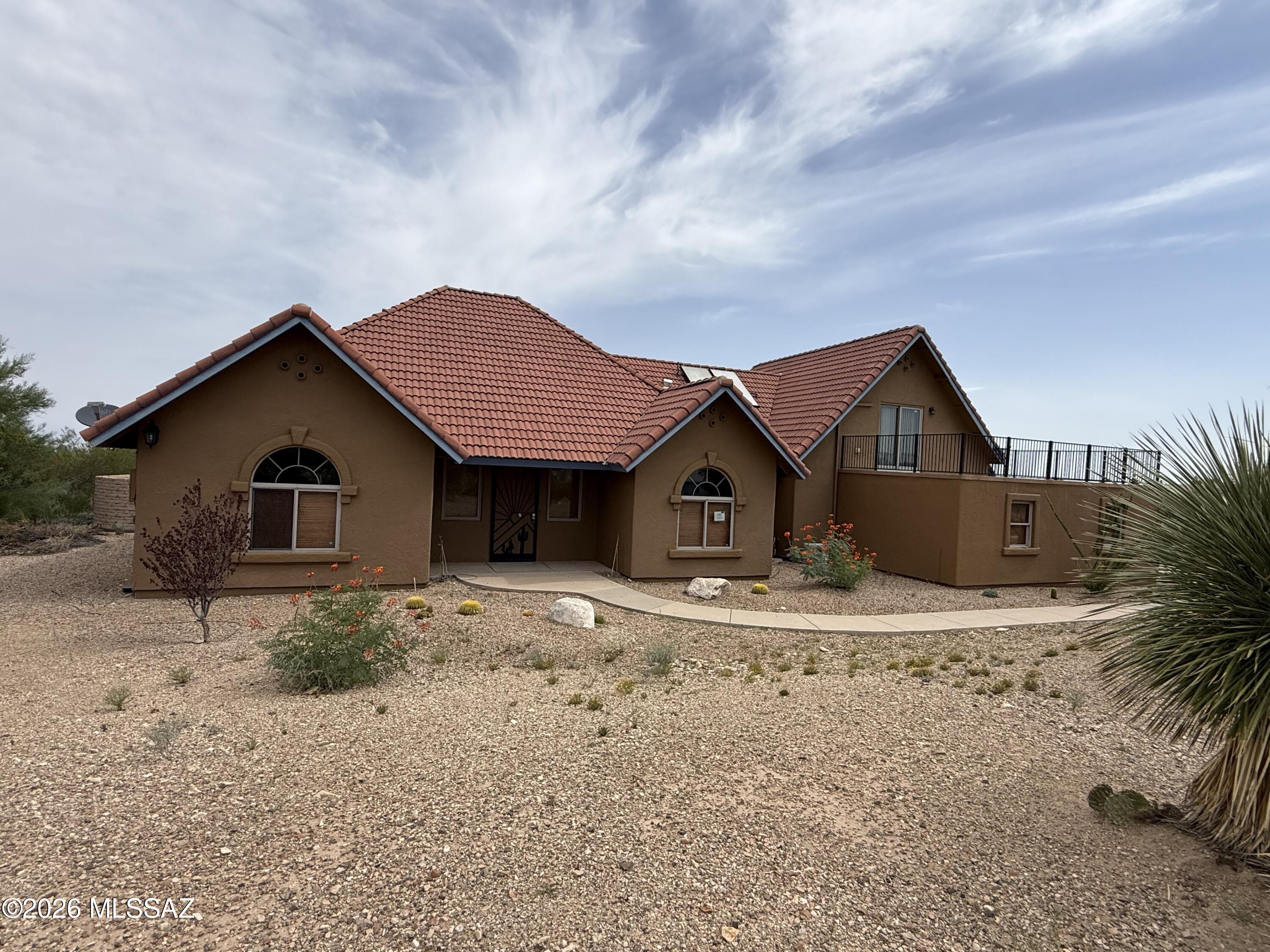 This beautiful home is just waiting for new owners. This home has a great room floor plan as well as split bedrooms. There are 2 master suites, one occupying the entire upper floor and a 2nd master bedroom downstairs. There is a well appointed kitchen with granite counters, nice pantry and stainless appliances. There is a gas fireplace in the living area that can be viewed from most of the main living area. Step out back and enjoy the large covered patio, pebble tec pool and plenty of room for the lounge chairs. No HOA Here! VA Vendee financing may be available on this property. Please see the documents.