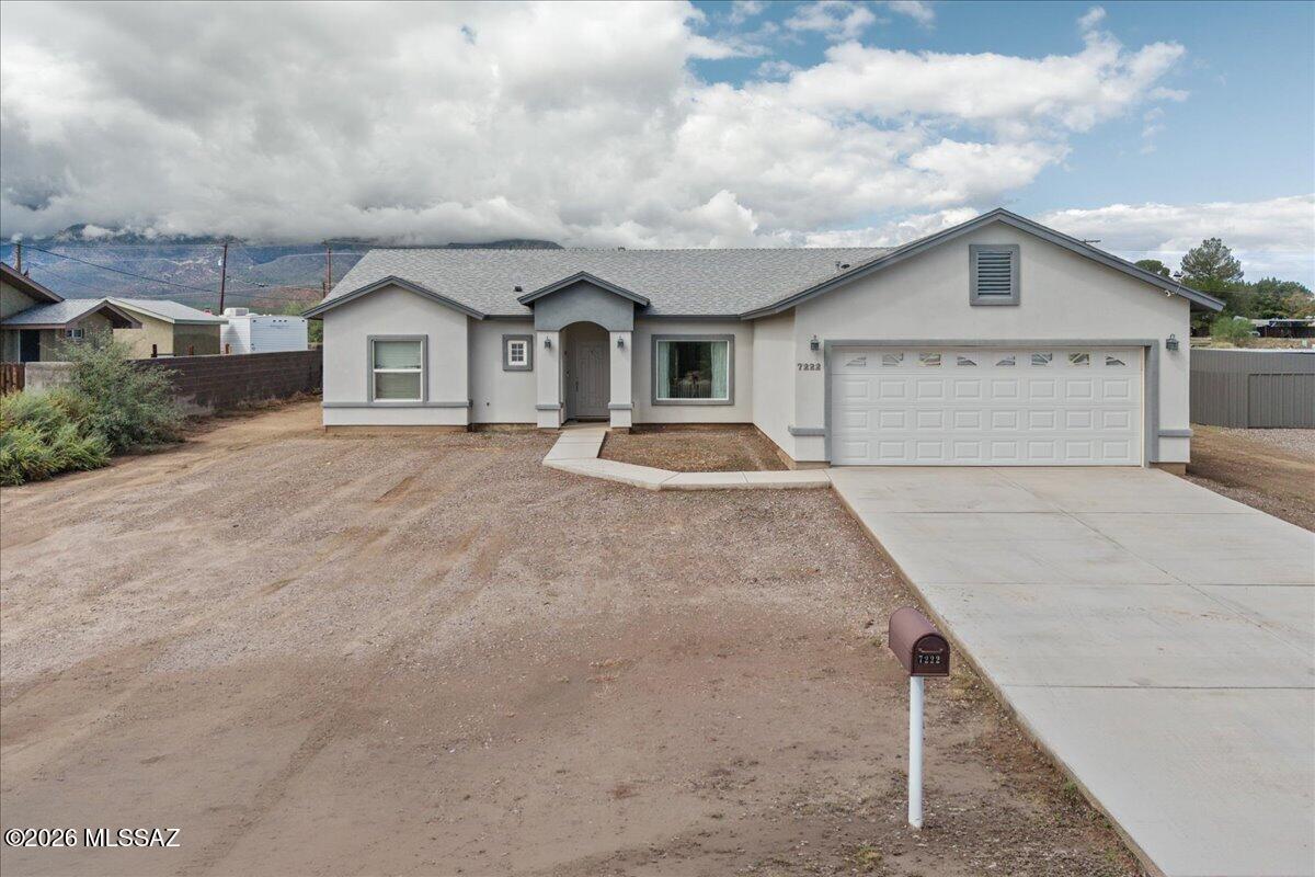 Beautiful Near-New Home with Mountain Views on .32 Acres
Don't miss this incredible opportunity to own a thoughtfully designed, near-new home in a peaceful rural neighborhood just south of Safford. Situated on a spacious .32-acre lot, this 1,662 sq. ft. home offers an inviting blend of modern finishes, functional design, and comfortable living with beautiful mountain views.
Inside, you'll find a spacious split-bedroom floor plan featuring 3 bedrooms and 2 bathrooms, an open-concept great room, and an abundance of storage throughout. The stunning kitchen is the heart of the home, featuring granite countertops, a large center island, stainless steel appliances, soft-close cabinetry, updated paint and hardware, and durable porcelain tile flooring.
The primary suite is designed for comfort  convenience with 2 walk-in closets and a beautifully finished private bathroom featuring a custom tile surround extending to the ceiling. The guest bathroom also features a custom tile surround to the ceiling. Recessed lighting throughout the home and ceiling fans in every bedroom add both style and comfort.
Additional features include an oversized laundry room with plenty of storage, a flexible formal dining room/office, 2x6 construction, spray foam insulation, and plumbing in place for gas. The attached 2-car garage has been enhanced with additional insulation and a mini-split AC system for year-round comfort.
Step outside onto the covered rear patio and take in the scenic mountain views. The spacious lot also offers raised garden beds, providing the perfect opportunity to grow your own vegetables, flowers, or herbs.
With its thoughtful construction, modern finishes, spacious layout, energy-conscious features, and peaceful setting, this home offers the opportunity to enjoy comfortable rural living while remaining conveniently close to Safford. Come see all this beautiful property has to offer!