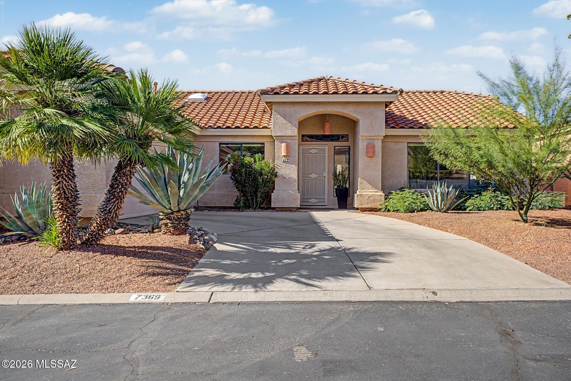 Your dream home is finally here! Fall in love with this gorgeous Sabino Canyon gem showcasing breathtaking mountain views! Discover a seamlessly flowing open floor plan, featuring Saltillo tile floors, vaulted ceilings, and a beehive fireplace that adds warmth and character. NEWLY REMODELED Gourmet kitchen offers matching appliances, abundant cabinetry, subway tile backsplash, recessed lighting, quartz counters, and a center island with a breakfast bar. Romantic main retreat boasts direct outdoor access, a private ensuite, and a walk-in closet. PLUS! Thoughtfully designed backyard oasis is ideal for year-round enjoyment, highlighted by a covered patio, sparkling refinished pool, and refreshing spa, the perfect setting for relaxing or hosting unforgettable gatherings. This gem has it all! Please see Upgrades List for details of the newly renovated kitchen, pool, and so much more.