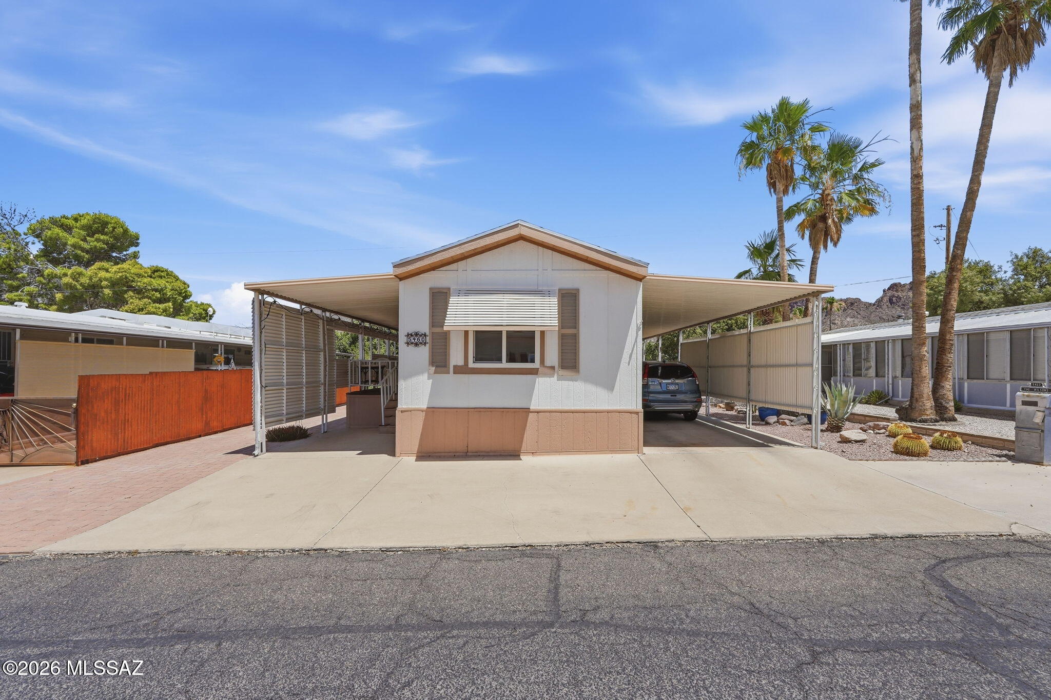 Charming fully furnished 2 Bed, 2 Bath manufactured home with 896SF of comfortable living in a desirable 55+ Community! This well-maintained home features wood laminate flooring, many upgrades, and a newer HVAC system for year-round comfort. Bright and inviting interior with an open feel plus ample storage throughout. Enjoy the convenience of an outdoor storage unit with a garage door for easy access.
 Community Amenities include pools, pickleball courts, social activities, and nearby hiking trails Move-in Ready and perfect for seasonal or full-time living!