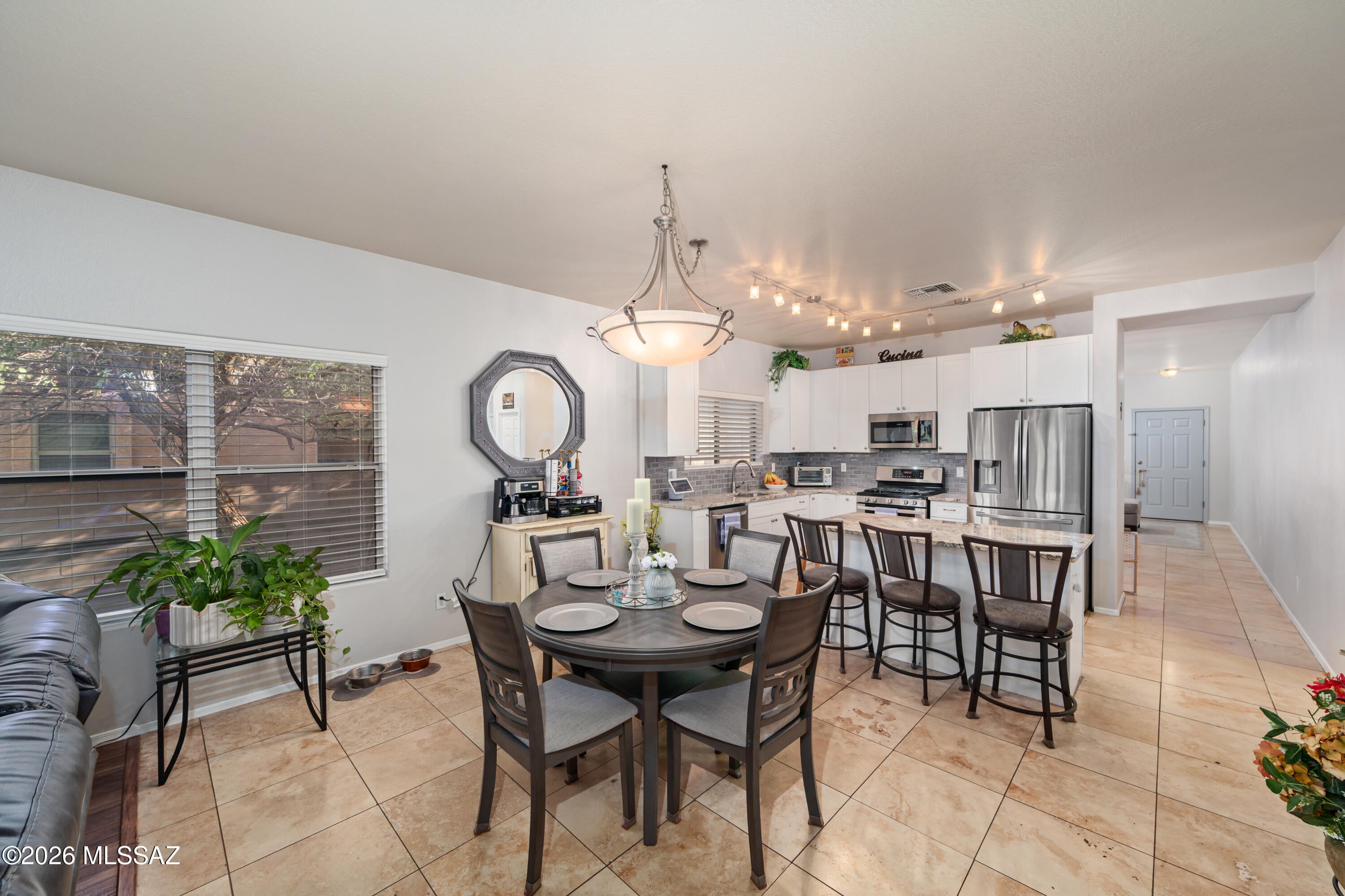 LOCATION, VIEWS & UPGRADES! Welcome to Rancho Vistoso in the heart of Oro Valley! This move-in-ready 3-bedroom, 2-bath, 1,921 sq. ft. home showcases beautiful Catalina Mountain views, a view fence and NO REAR NEIGHBORS! Step inside to a completely renovated kitchen featuring granite countertops and a gas range, plus updated bathrooms with walk-in showers. NO CARPET throughout! Additional upgrades include a NEW HVAC system and recently painted exterior. Enjoy privacy, mountain views and an unbeatable Oro Valley location close to shopping, dining, parks, trails, golf and more. This one checks all the boxes!