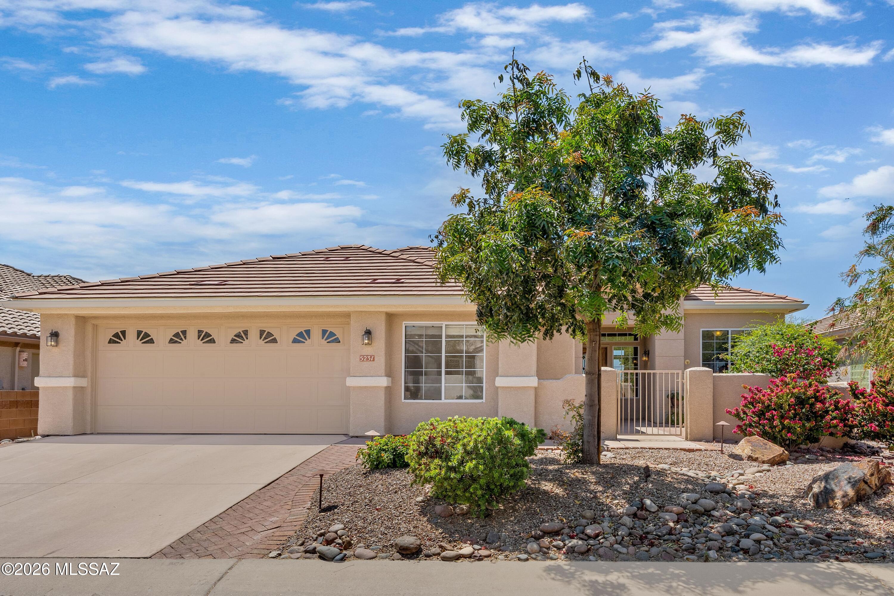 Located in The Highlands at Dove Mountain, a Premier 50+ Active Adult Community on a Championship Arthur Hills Golf Course, this Extensively Updated Home Offers an Excellent 1,953 SF Floorplan w/ 2 Bd/2 Ba & Separate Living & Family Rooms for Flexible Living. Easily Adaptable for Accessible Living. Upgraded Throughout w/ Brand New ''Harvest Hues Oak'' Vinyl Plank Flooring, a Beautifully Appointed Kitchen w/ New GE SS Double Oven, Microwave & Dishwasher, Corian Countertops, Cherry Cabinetry, Custom Tile Backsplash, Pantry & Multiple Dining Options Including a Nook, Breakfast Bar & Formal Dining Area. Major Improvements:  a Rebuilt 25 SEER HVAC, Newer Water Heater, Radiant Barrier Insulation w/ Solar Roof Fans for Enhanced Energy Efficiency & a Full-Home Pelican Water Filtration System! The Full-Home Pelican Water Filtration System Treats Water at the Point of Entry, Delivering Clean, Filtered Water to Every Faucet - Reducing Chlorine, Chemicals & Sediment for Improved Taste & Water Quality While Helping Protect Plumbing, Fixtures & Appliances w/ a Low-Maintenance, Energy-Efficient Design.  

The Home Has an Added Layer of Protection Against Water Damage, w/ Two Upgraded Shut-Off Controls Installed in 2015, Enabling House Water Cut-Off While Leaving Irrigation Operating Independently.

The Spacious Owner's Suite Offers Peaceful Backyard Views, Patio Access, Dual Vanities, Soaking Tub, Walk-In Tub & a Custom Organized Closet. 

A 2-Car Garage w/ Golf Cart Space, Built-In Cabinetry & Workbench Adds Functionality. Rebuilt Insulated Garage Door in 2024 w/ Belt Drive System, New Main Springs, New Hinges & All New Hardware.

Enjoy Inviting Outdoor Living w/ a Charming Front Courtyard & a Private Backyard Featuring a Brick Patio, Built-In BBQ, Mature Landscaping & Producing Citrus--Perfect for Relaxing or Entertaining in a Quiet Desert Setting.

Dove Mountain Is a Premier 6,200+ Acre Golf Resort Community in the Sonoran Desert Offering 50+ Miles of Hiking & Biking Trails, Parks, Sport Courts, Dog Parks & Scenic Walking Paths.
